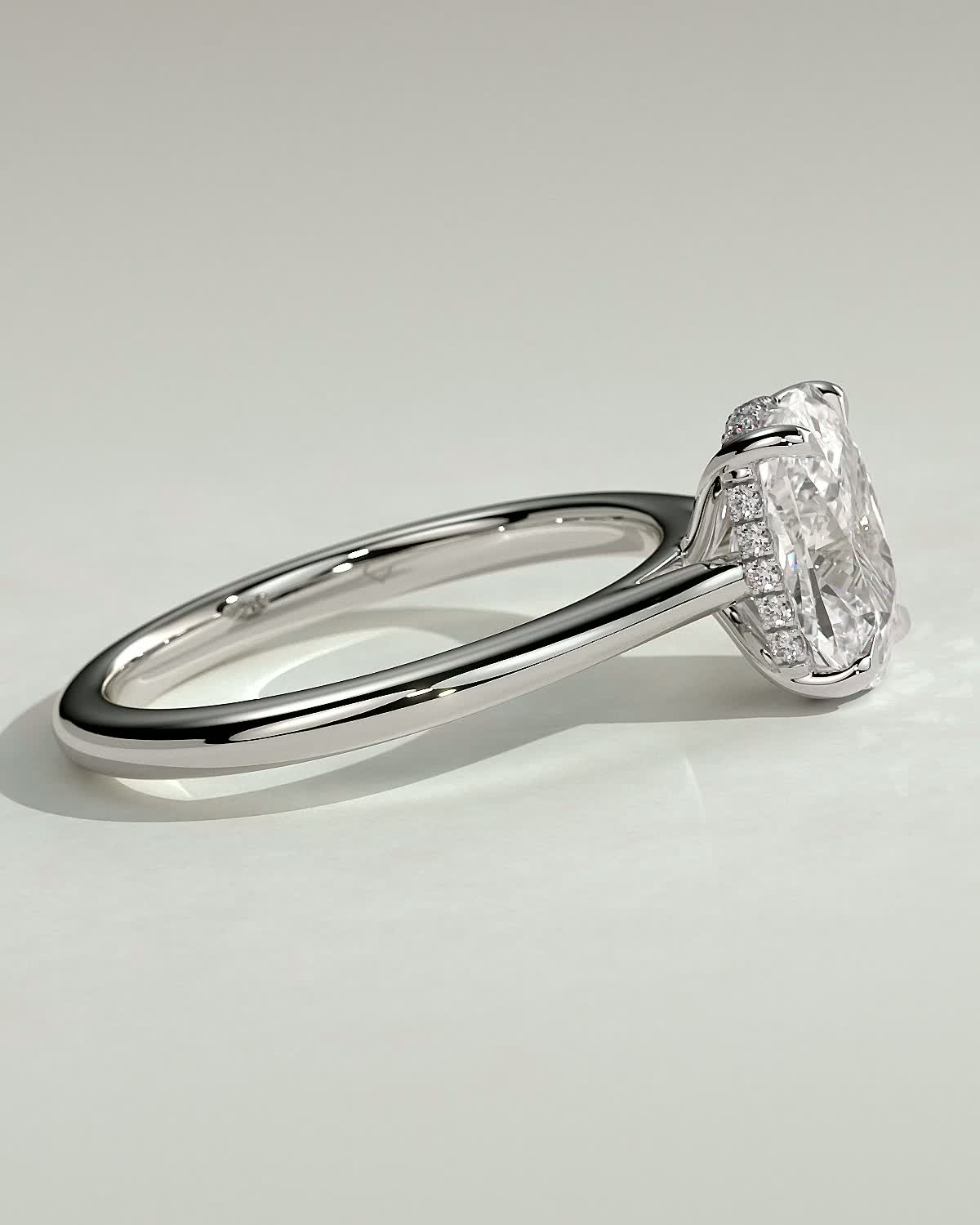 Wendy - 4 Claw Elongated Cushion Solitaire - 18k White Gold