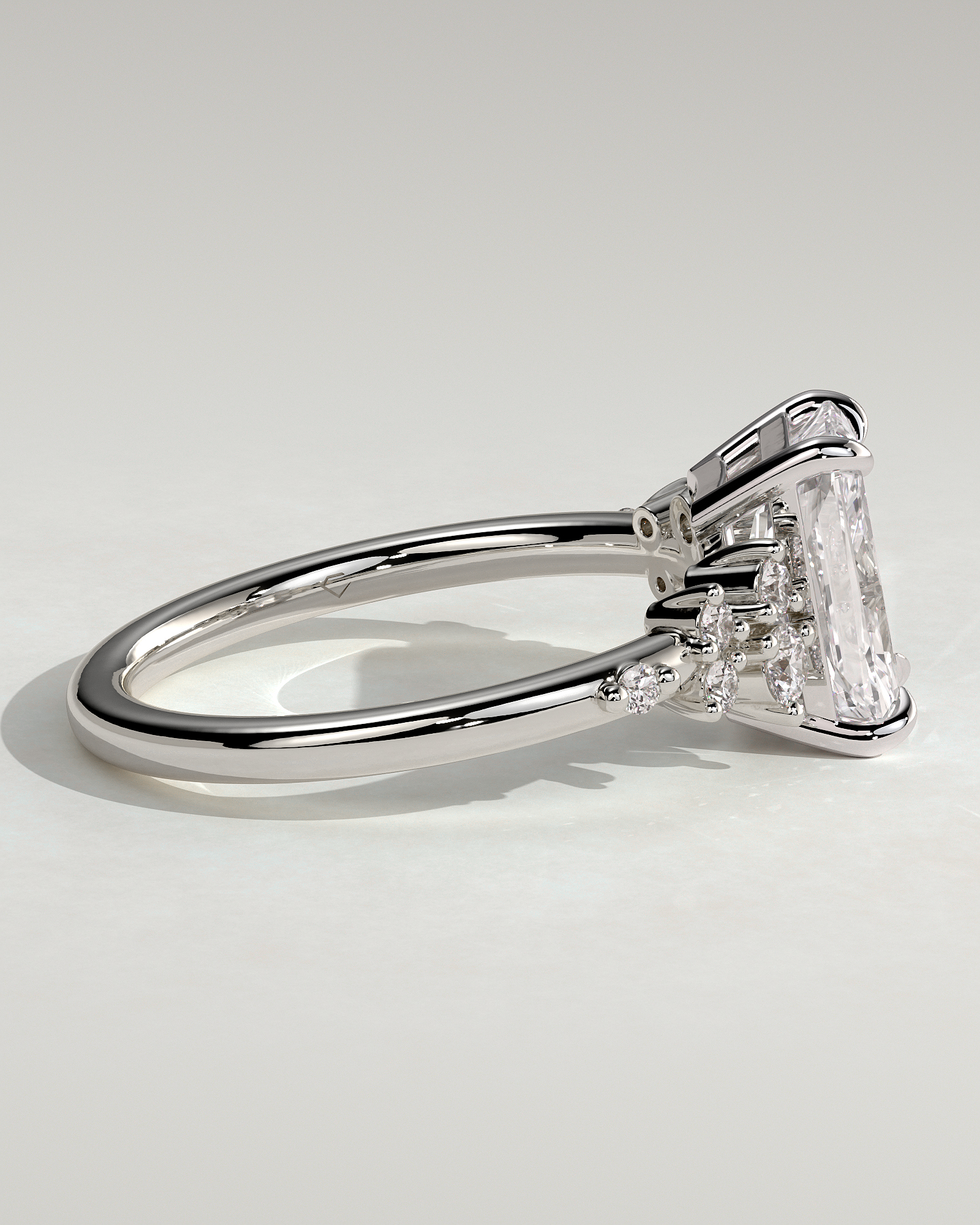 Radiant 4 Claw Solitaire with Clustered Round Shoulder Stones Engagement Ring - 18k White Gold