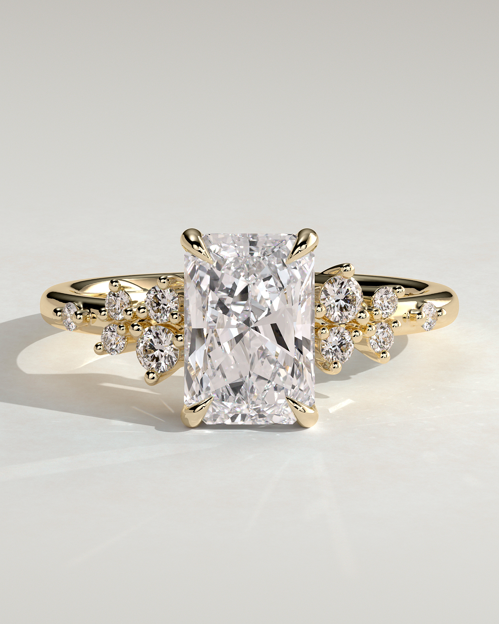 Radiant 4 Claw Solitaire with Clustered Round Shoulder Stones Engagement Ring - 18k Yellow Gold