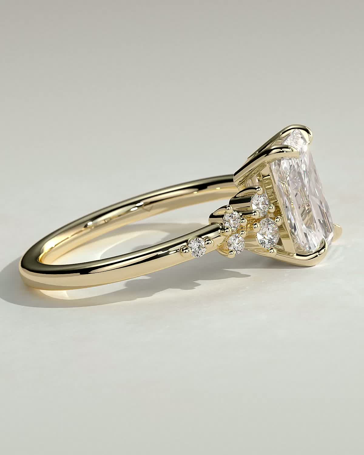 Radiant 4 Claw Solitaire with Clustered Round Shoulder Stones Engagement Ring - 18k Yellow Gold