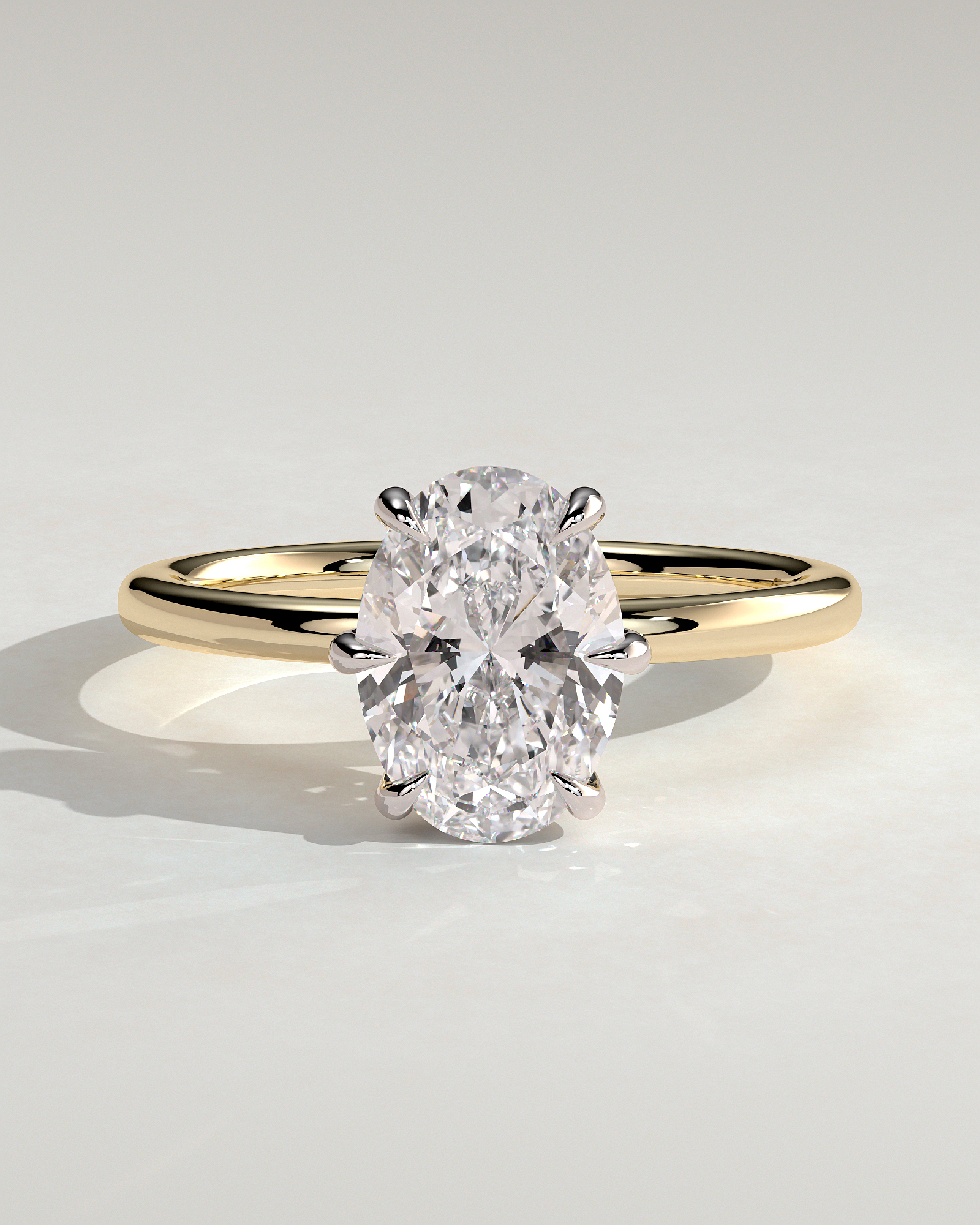 Wilma - Six Claw Oval Solitaire - 18k Yellow Gold / 18k White Gold