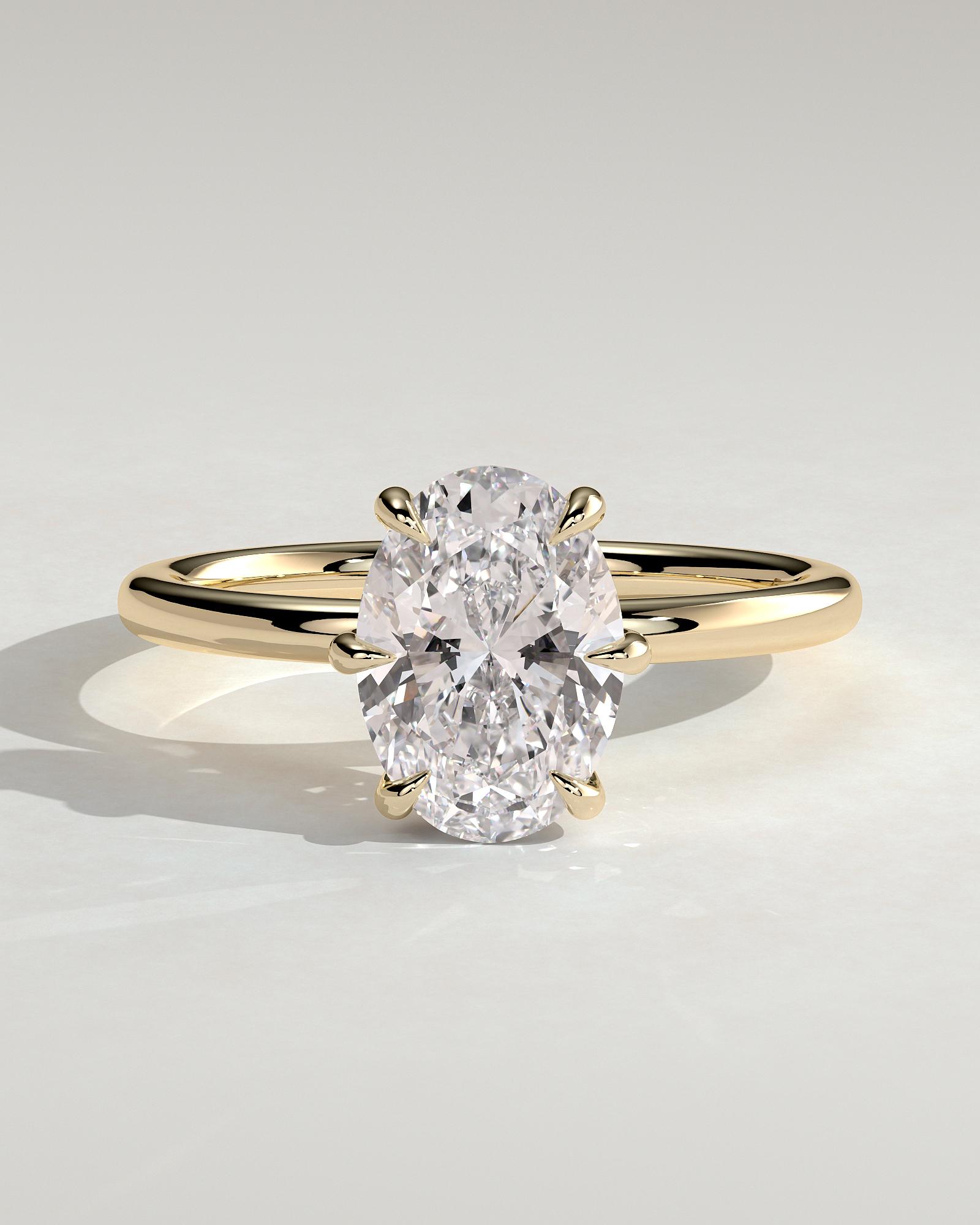 Wilma - Six Claw Oval Solitaire - 18k Yellow Gold
