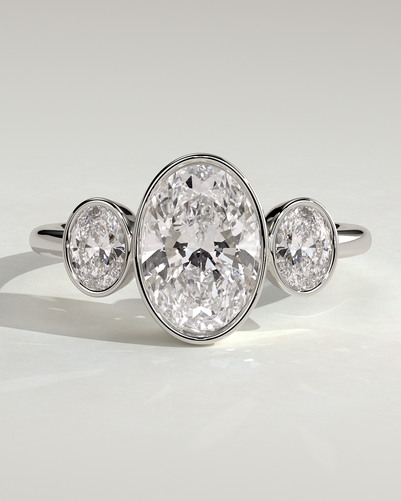 Zelda - Bezel Set Oval Trilogy - 18k White Gold