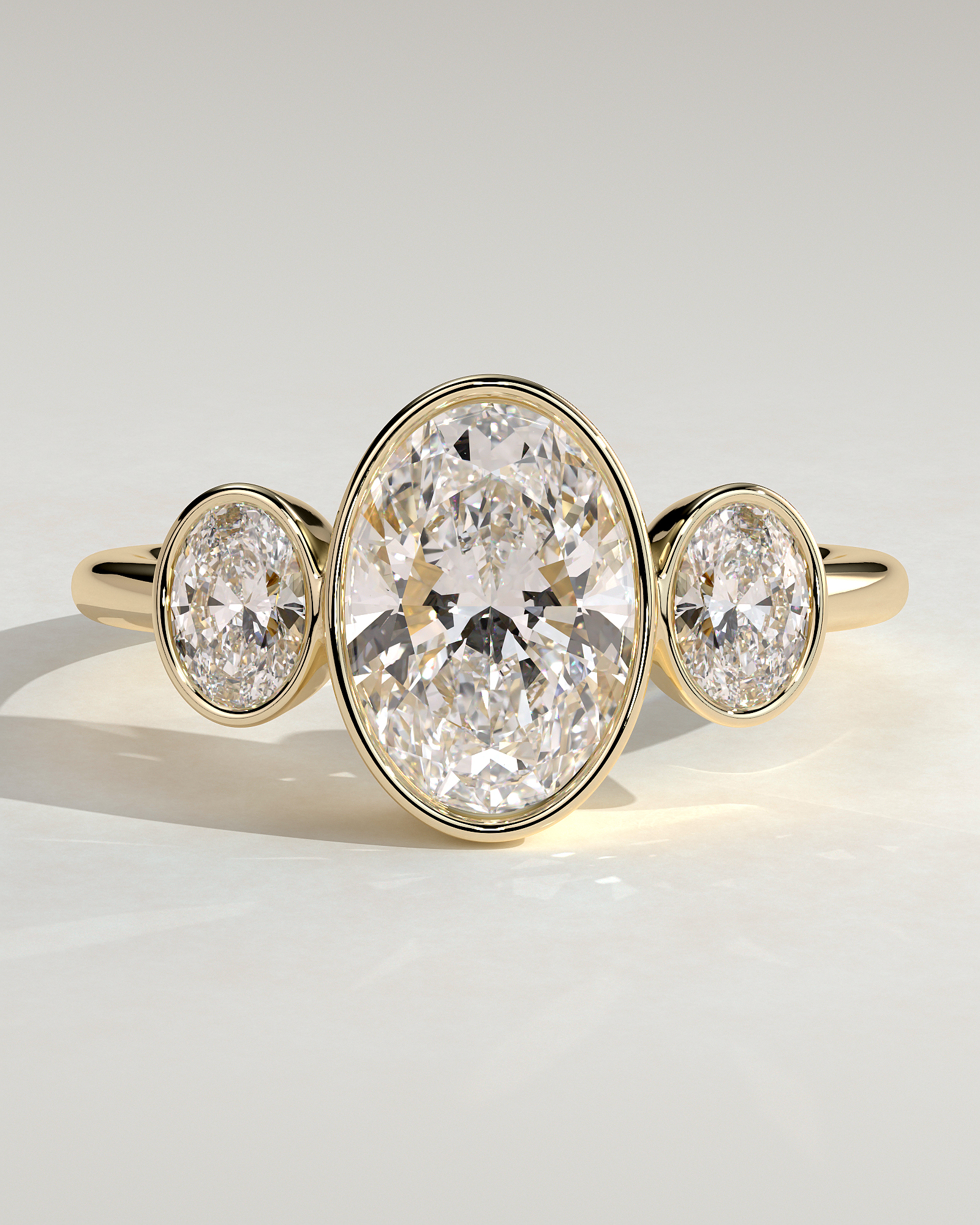 Zelda - Bezel Set Oval Trilogy - 18k Yellow Gold