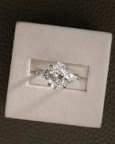Alexia - Oval Claw Trilogy with Pear Side Stones and Cathedral
