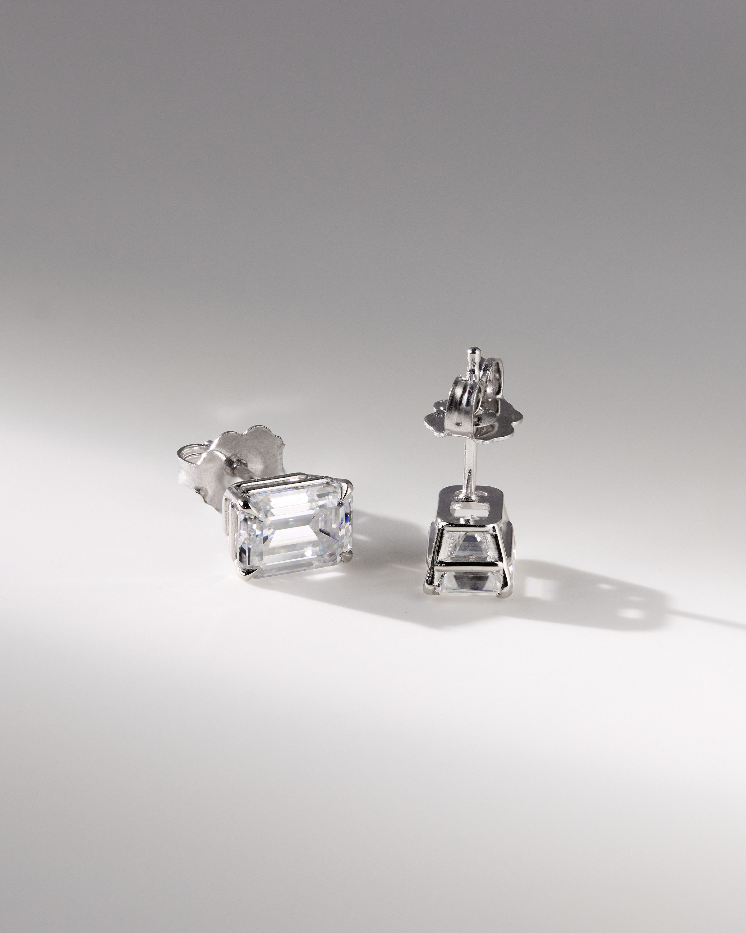 Barbara - Emerald 4 Claw Earrings Lifestyle Image