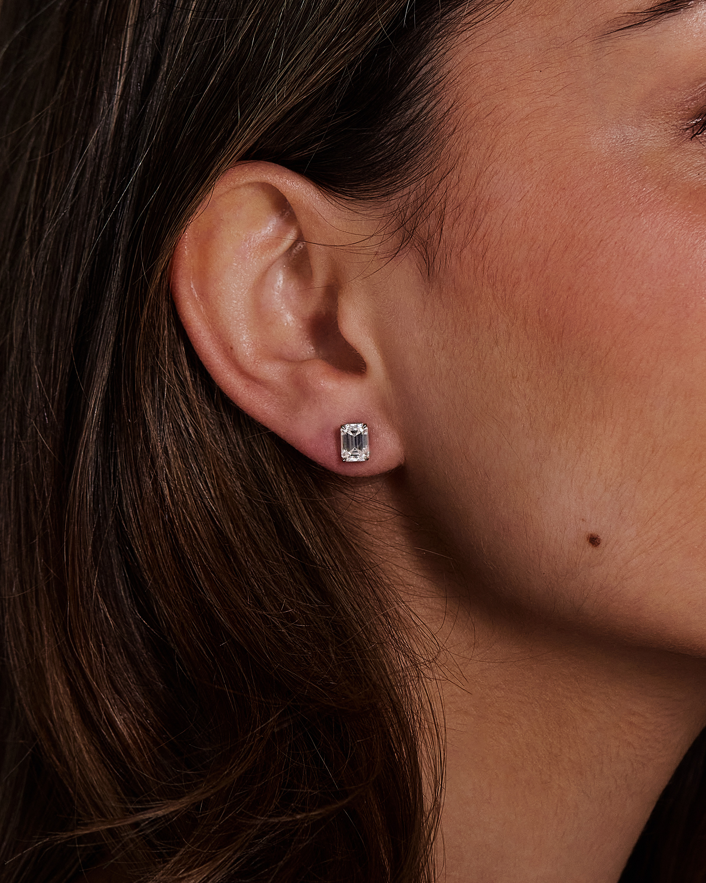 Barbara - Emerald 4 Claw Earrings Lifestyle Image