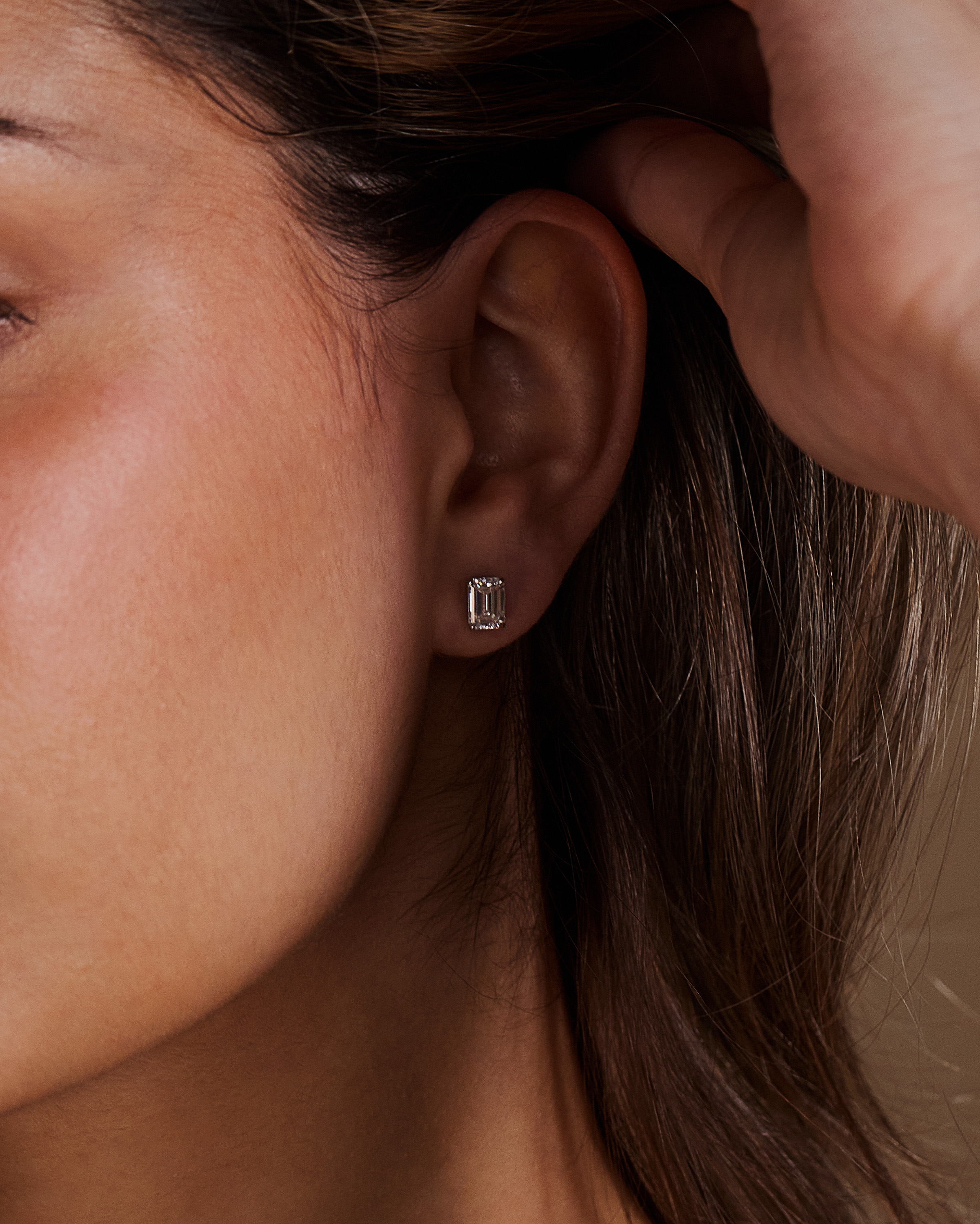 Barbara - Emerald 4 Claw Earrings Lifestyle Image