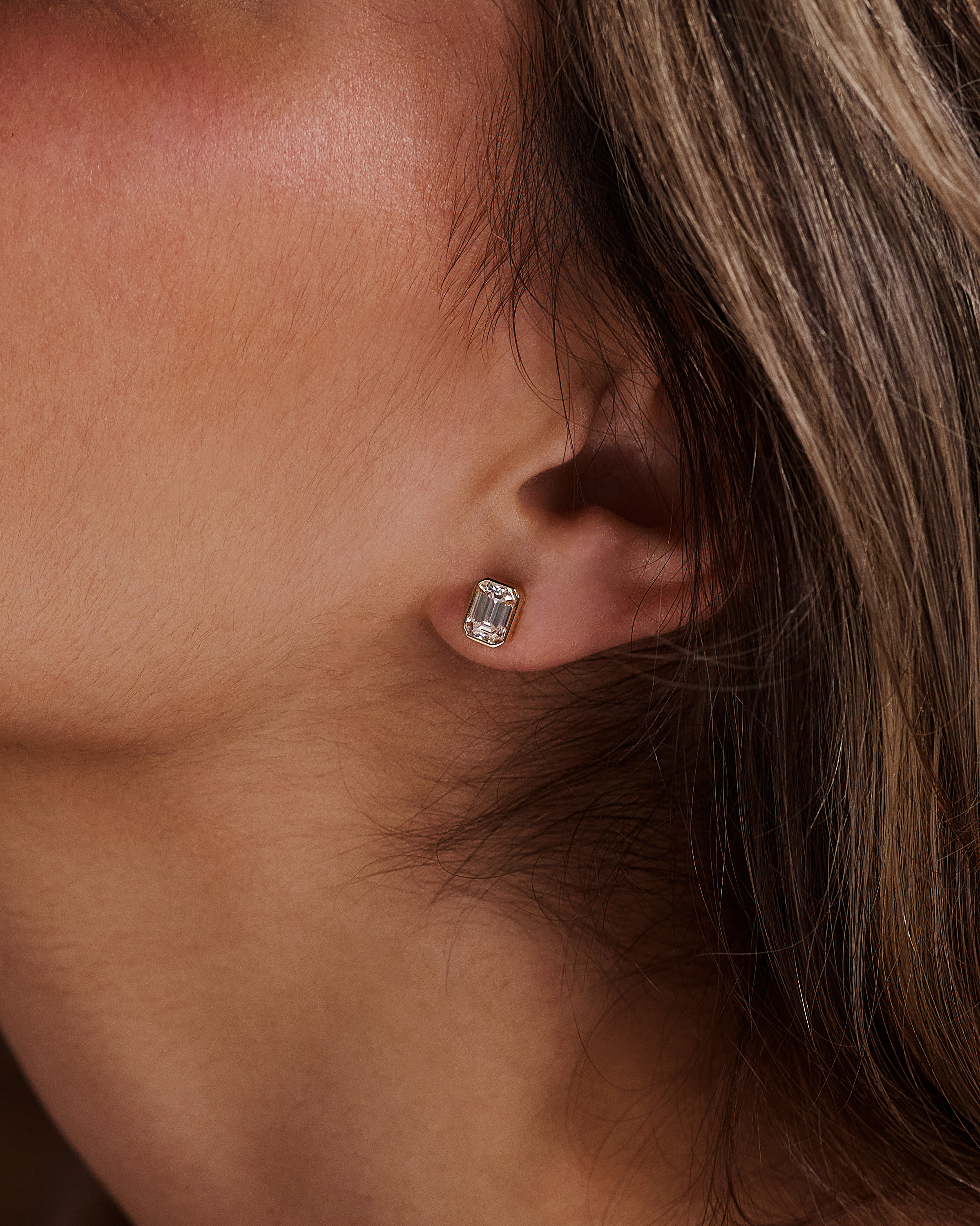 Kara - Emerald Bezel Earrings Lifestyle Image