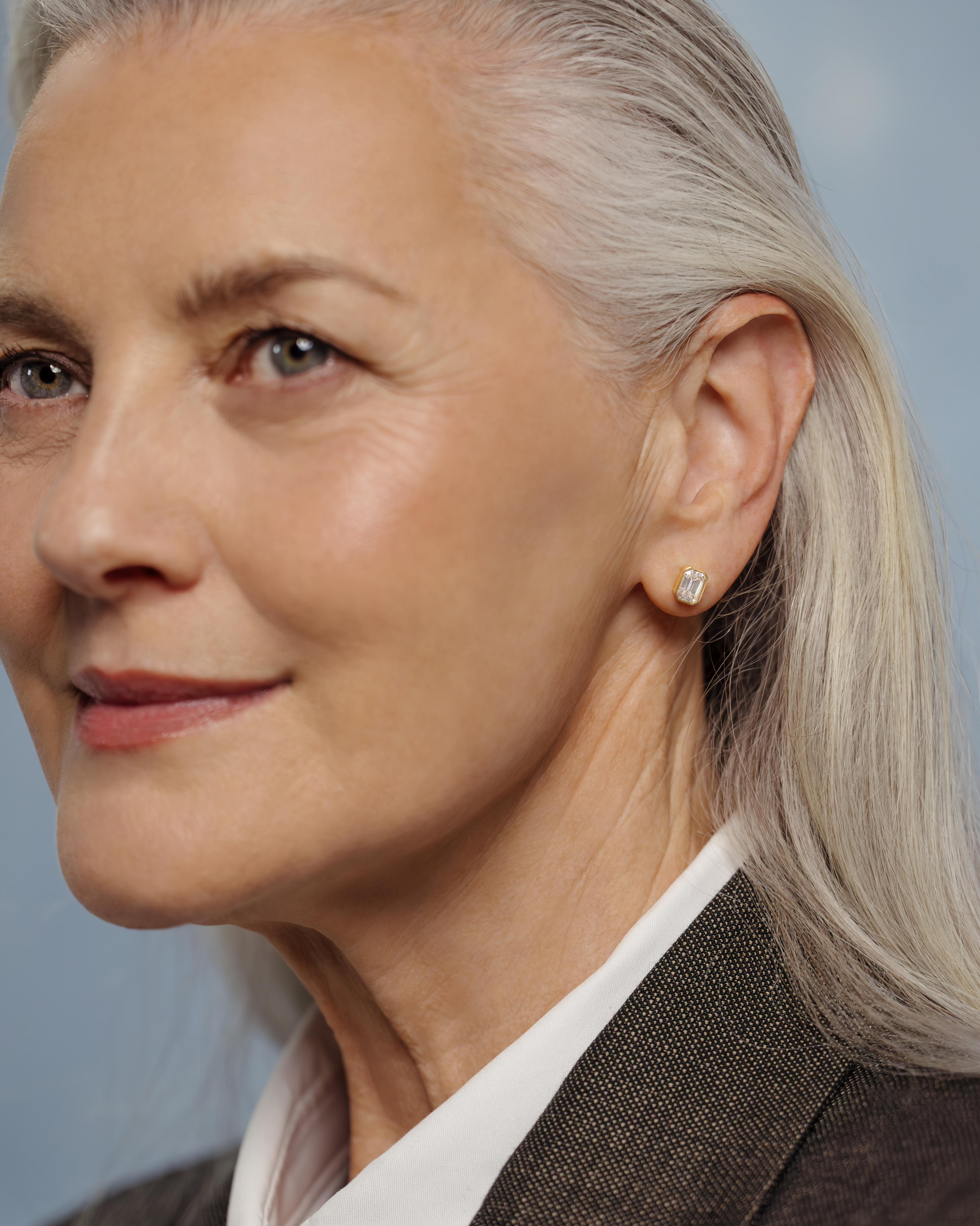 Kara - Emerald Bezel Earrings Lifestyle Image