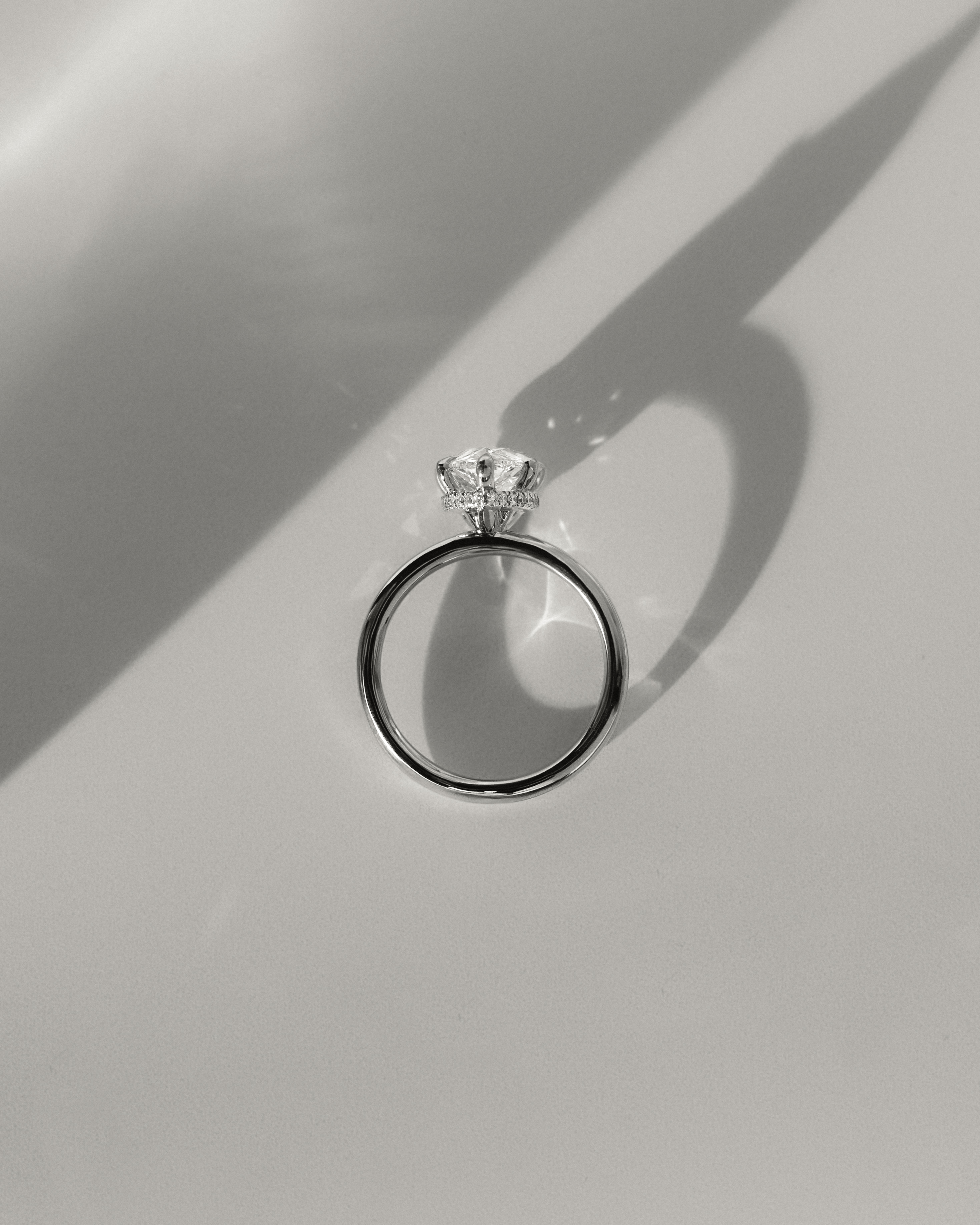 Ainsley - 5 Claw Pear Solitaire with Hidden Halo Lifestyle Image