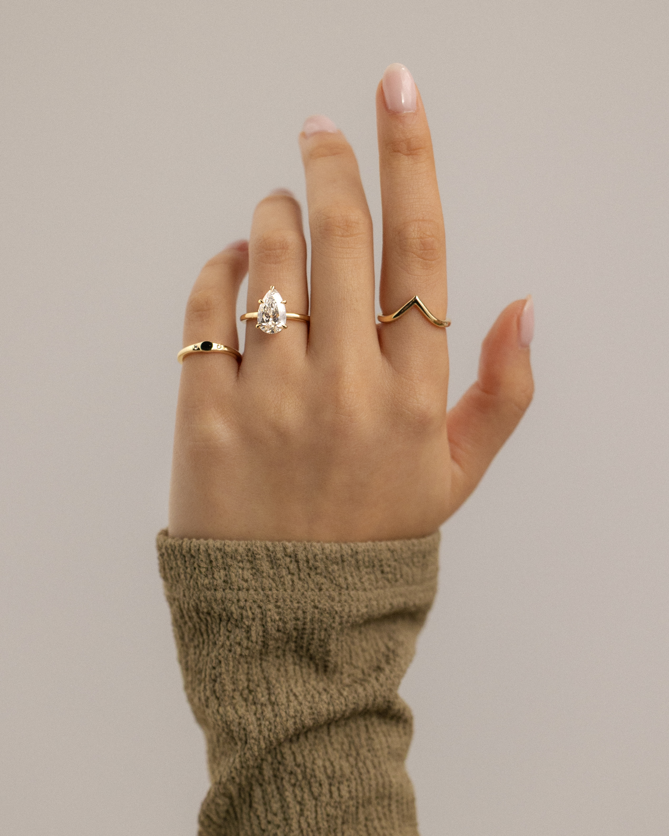 Ainsley - 5 Claw Pear Solitaire with Hidden Halo Lifestyle Image