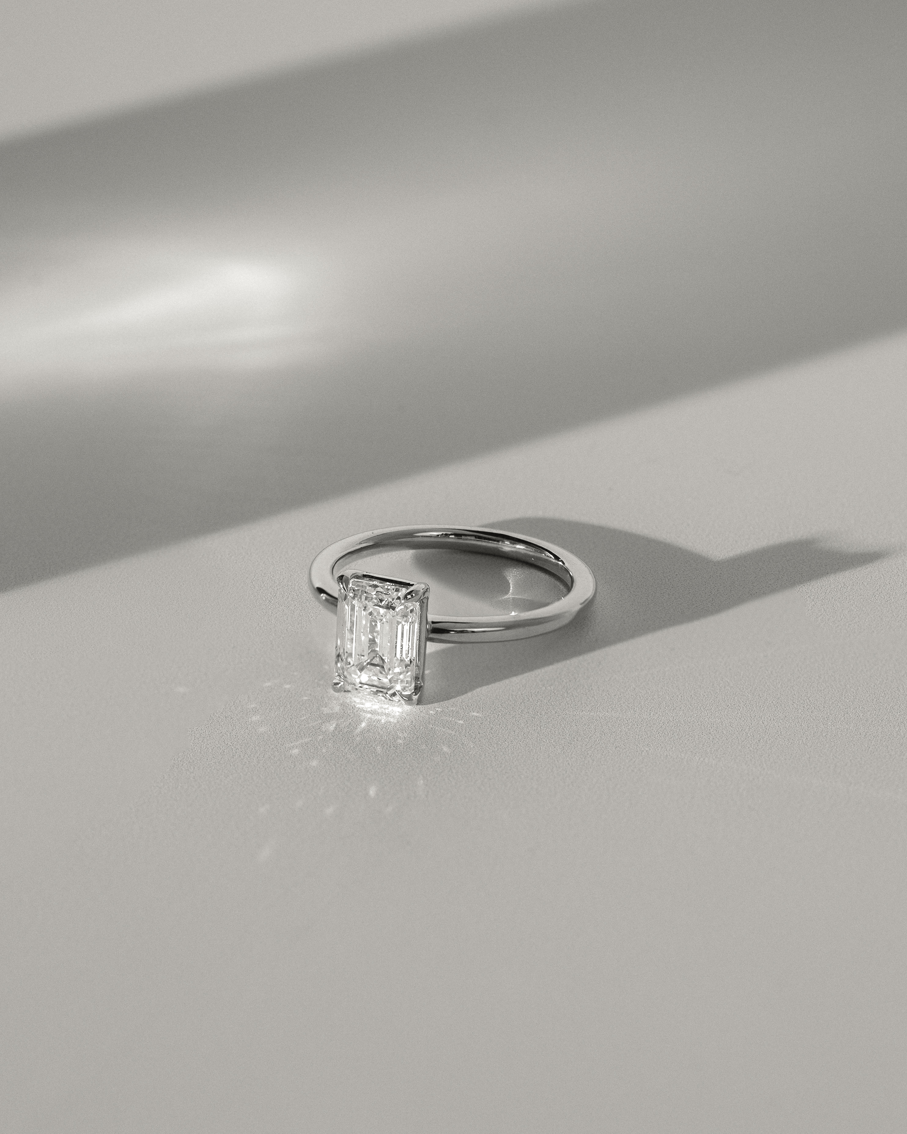 Alina - 4 Claw Emerald Solitaire Lifestyle Image