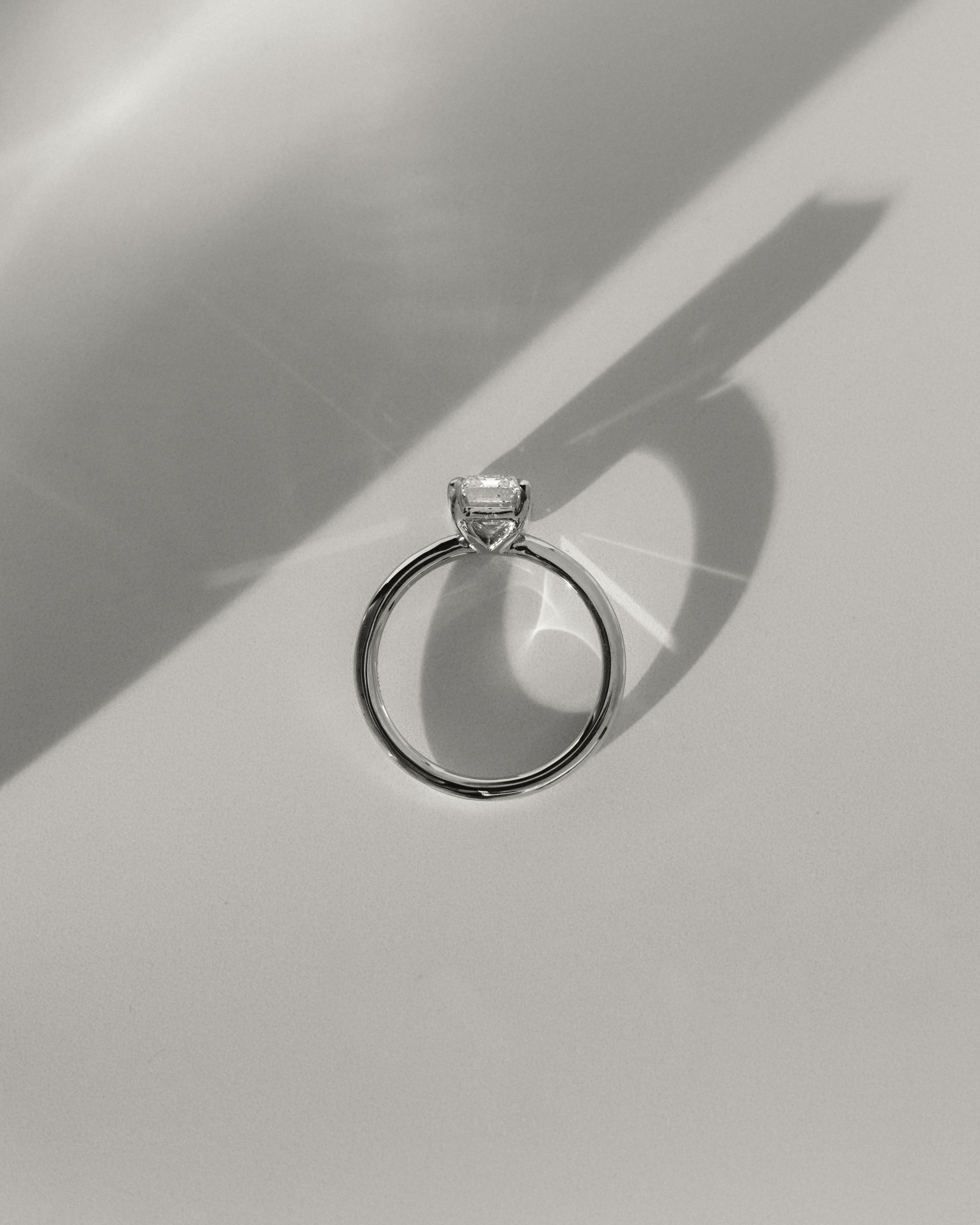 Alina - 4 Claw Emerald Solitaire Lifestyle Image