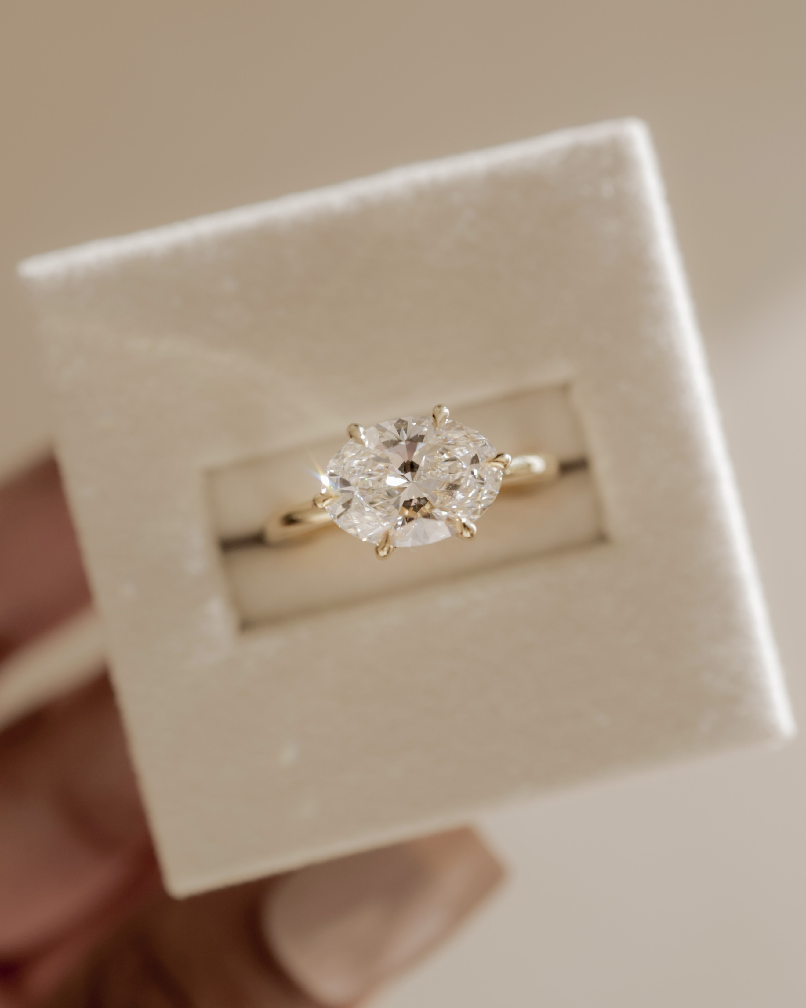 Allison - Oval East-West Solitaire Lifestyle Image