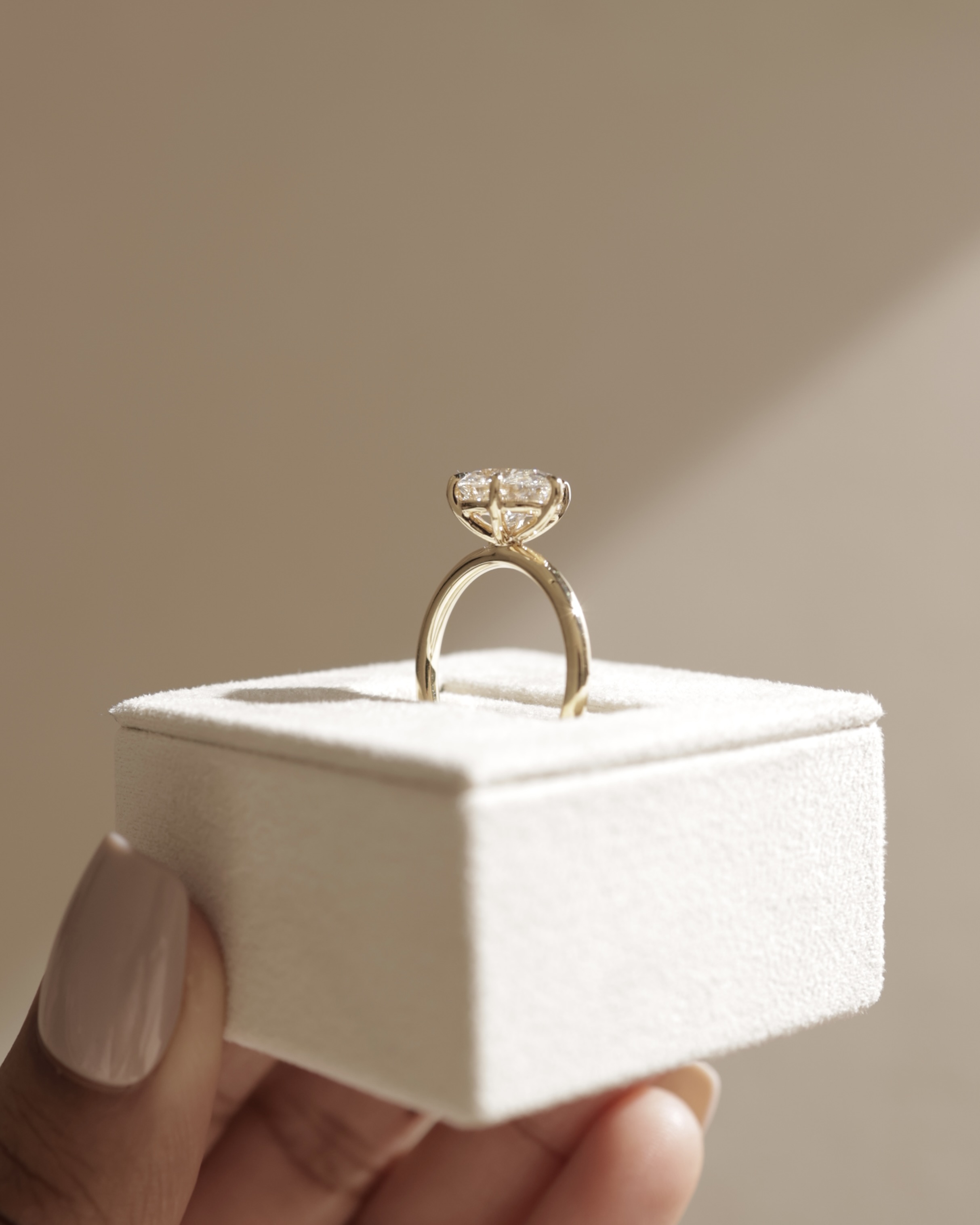 Allison - Oval East-West Solitaire Lifestyle Image