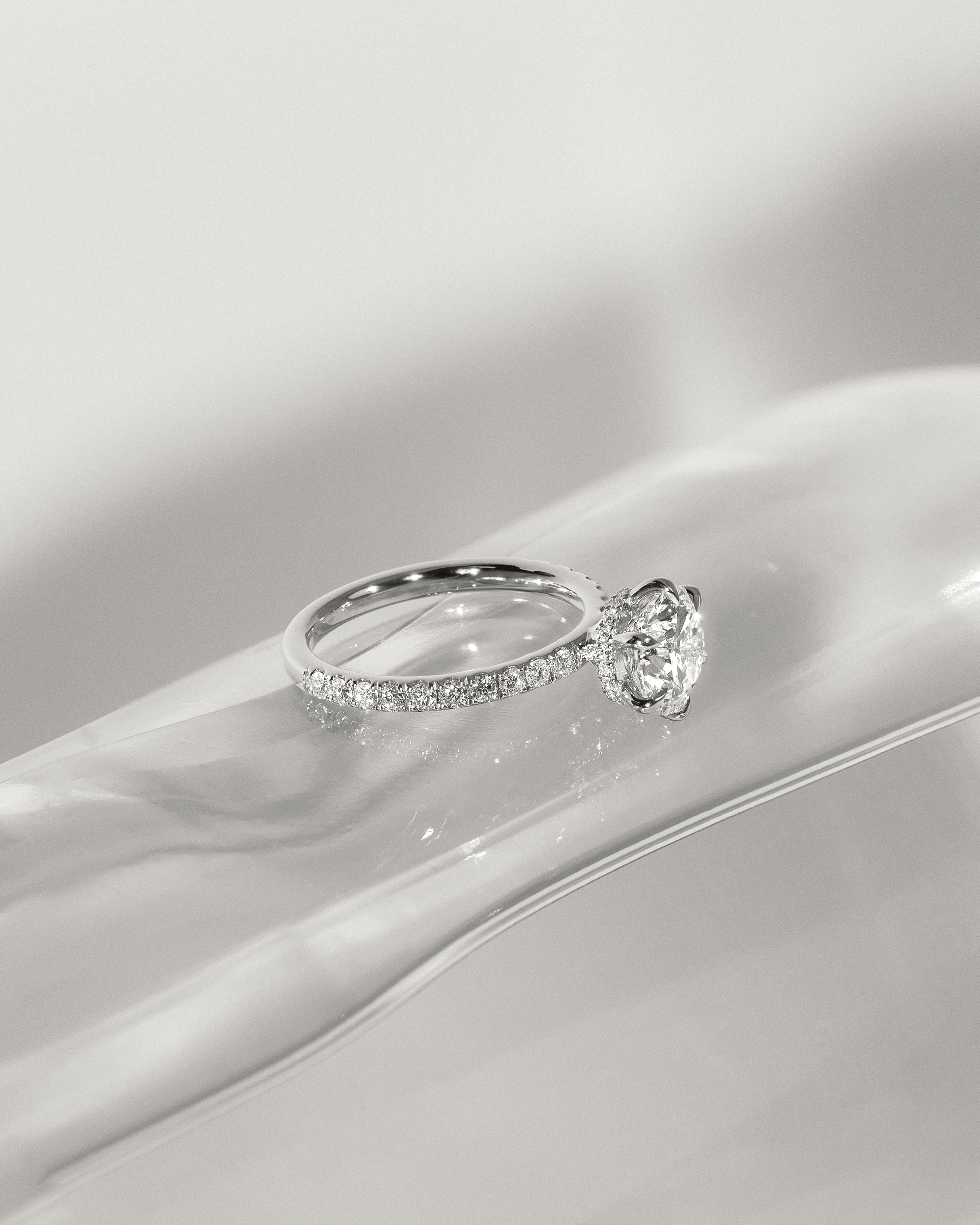 Amanda - 6 Claw Pav Round Solitaire with Hidden Halo Lifestyle Image