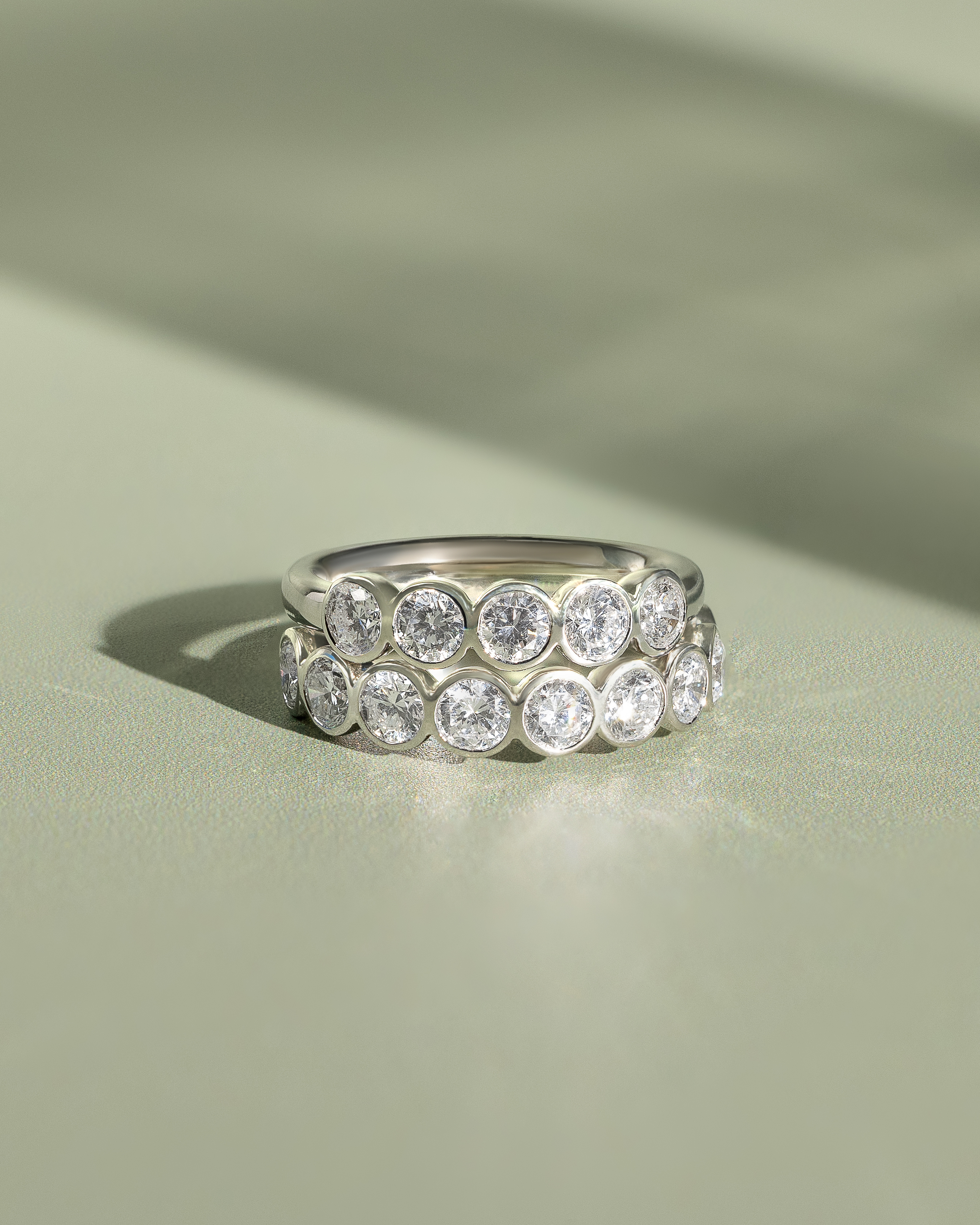 Amber - Bezel Set Round Wedding Ring Lifestyle Image