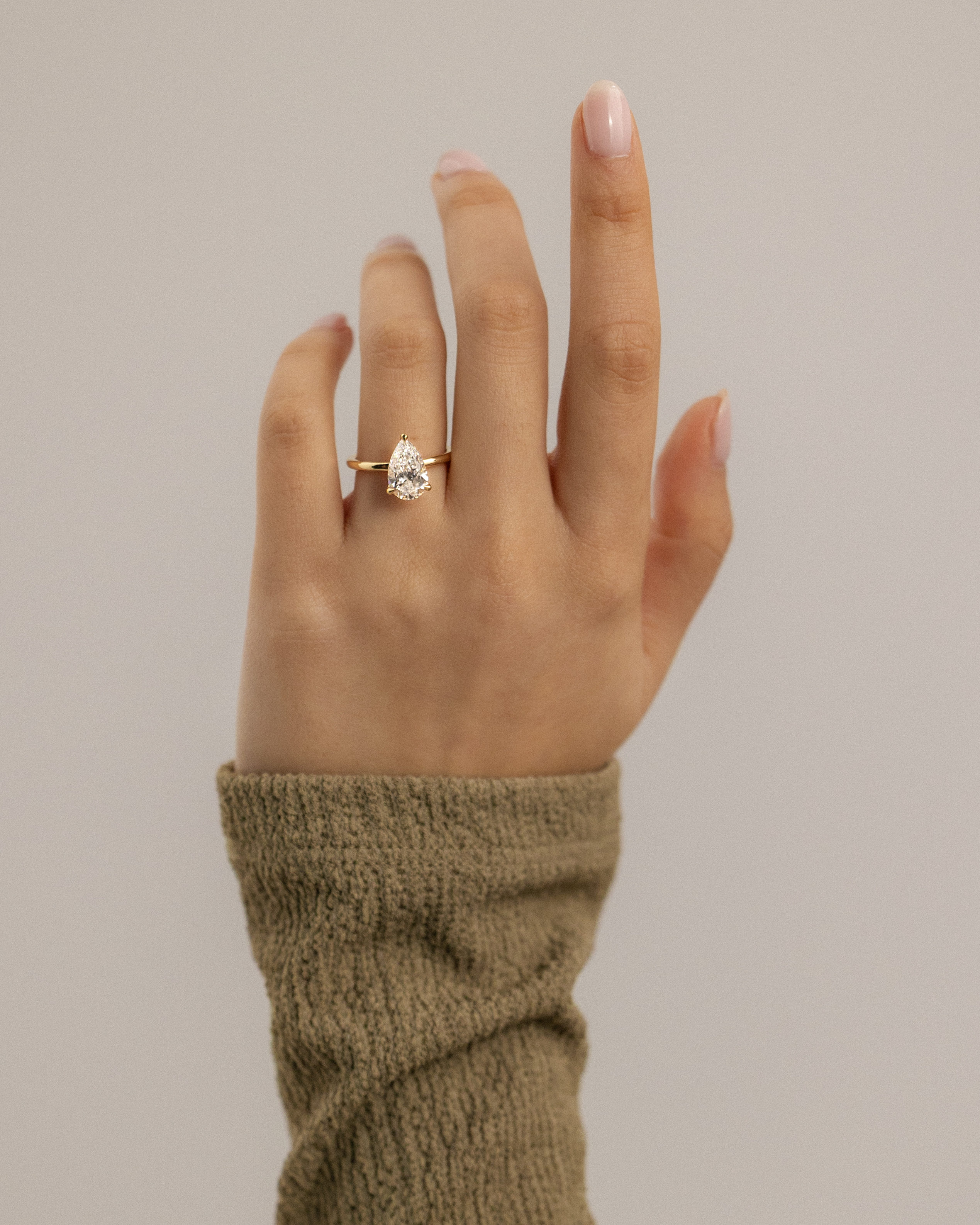 Amy  3 Claw Pear Solitaire Lifestyle Image