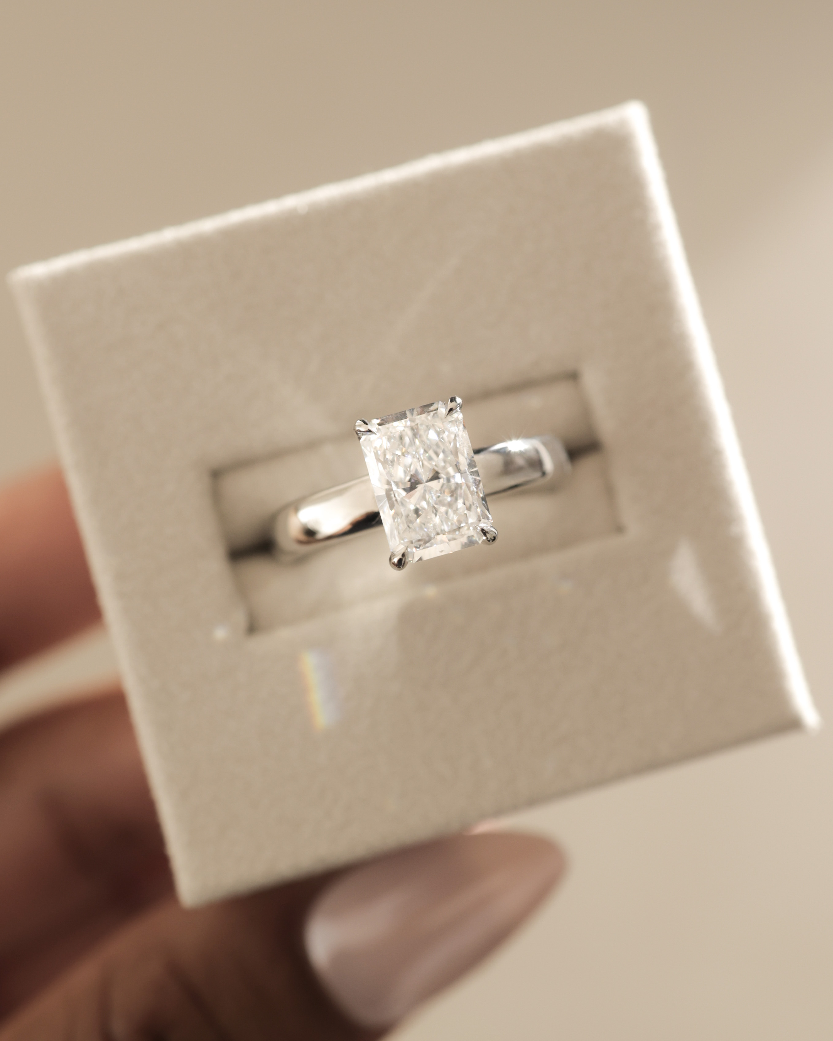 Angelina - Radiant Solitaire with Hidden Halo and Cigar Band Lifestyle Image