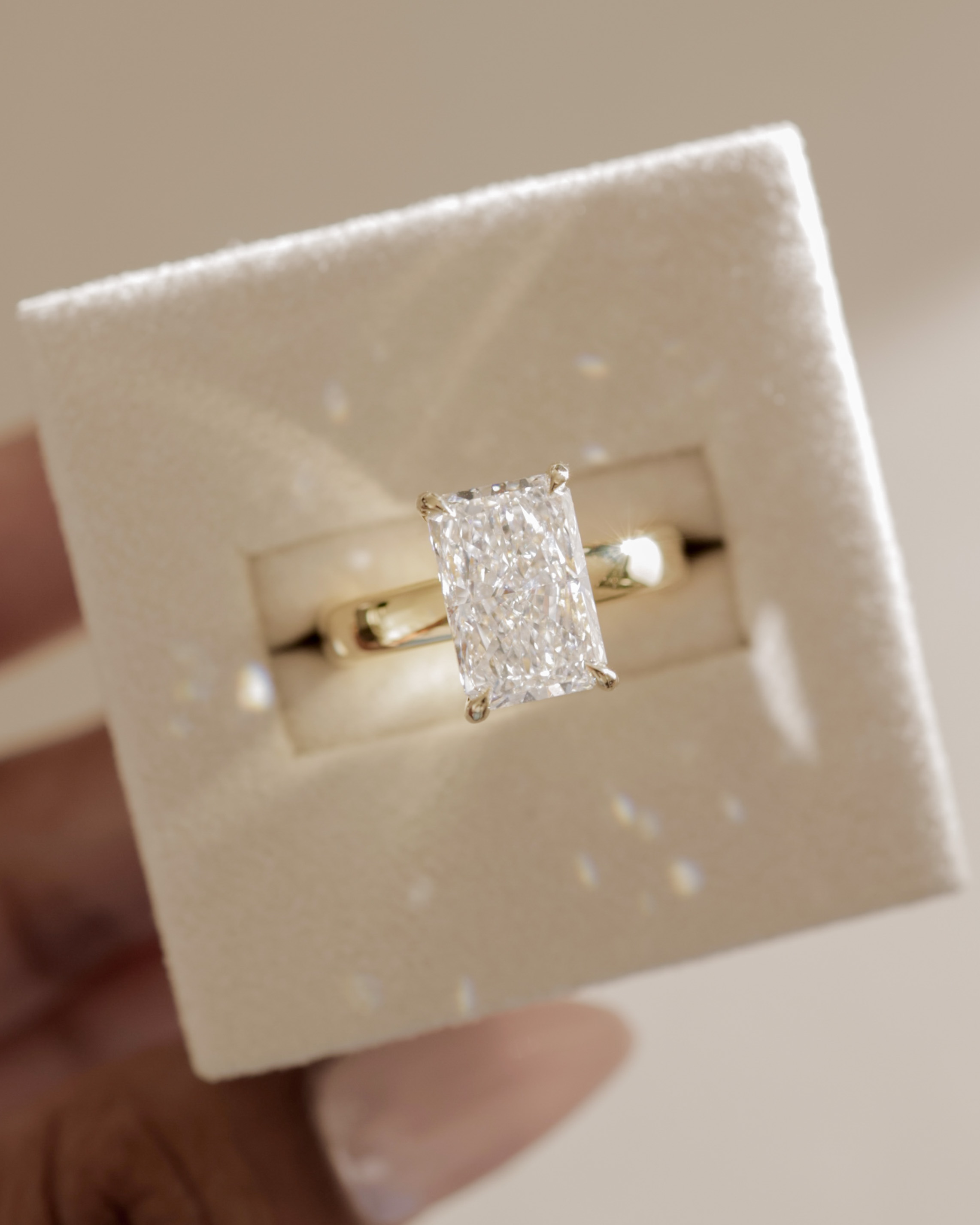 Angelina - Radiant Solitaire with Hidden Halo and Cigar Band Lifestyle Image