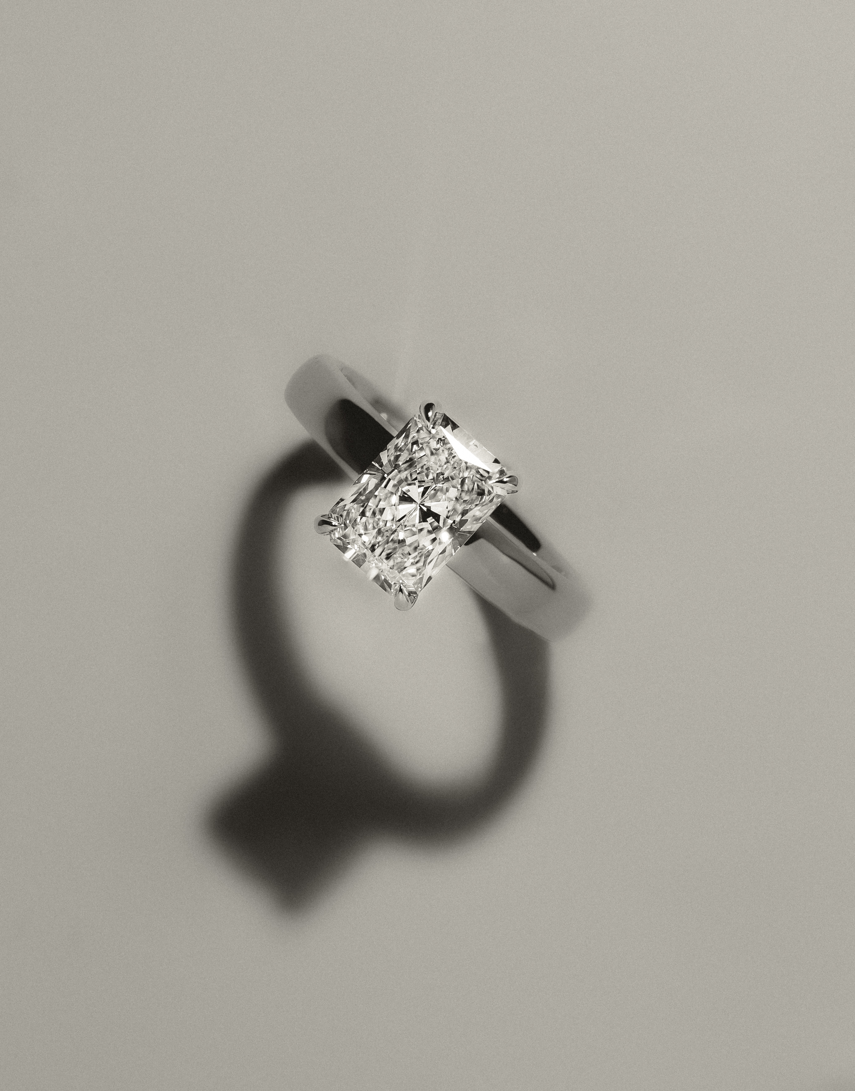 Angelina - Radiant Solitaire with Hidden Halo and Cigar Band Lifestyle Image