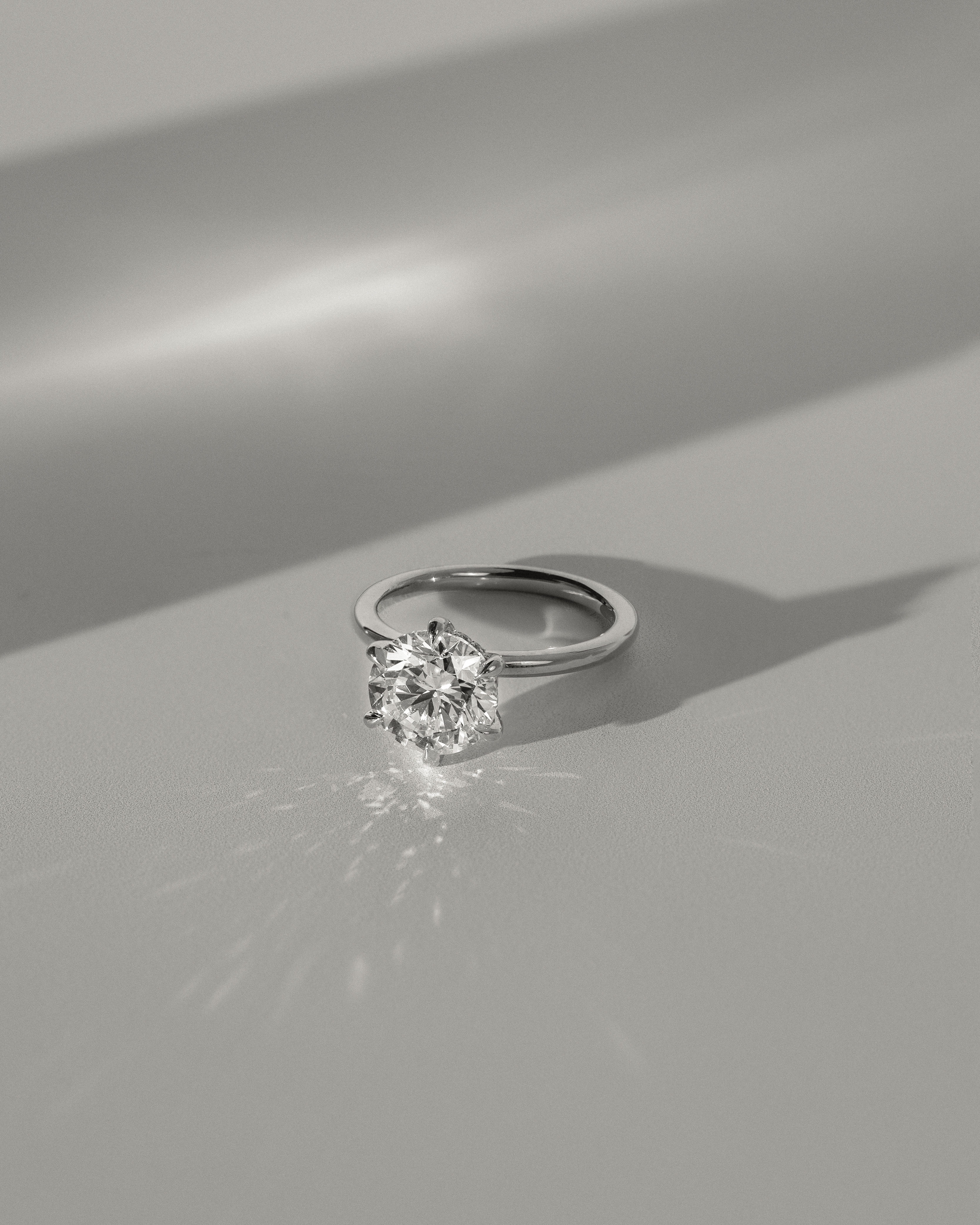 Anna  6 Claw Round Solitaire with Hidden Halo Lifestyle Image