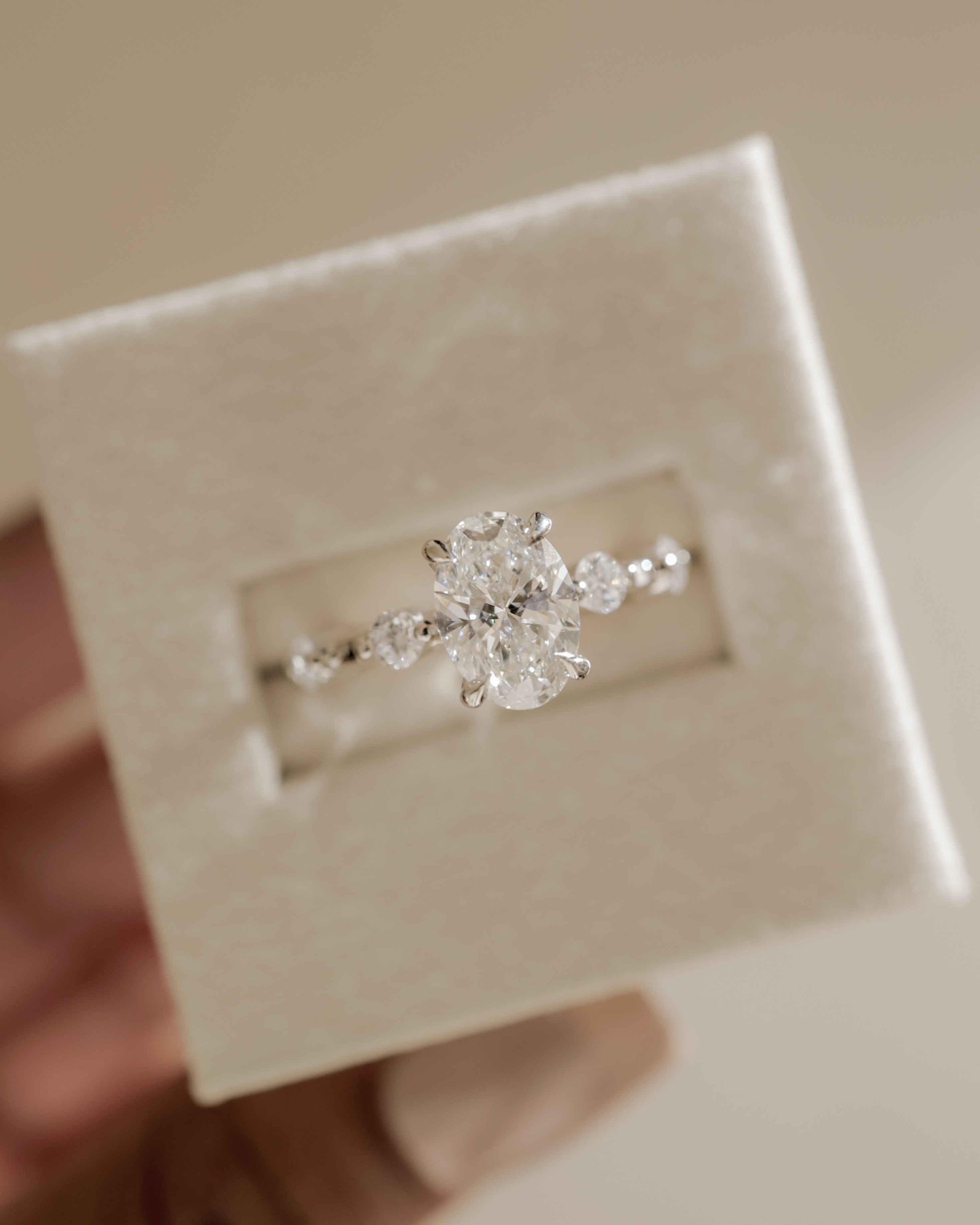 Arwen - Oval Solitaire with Hidden Halo and Accent Stones Lifestyle Image