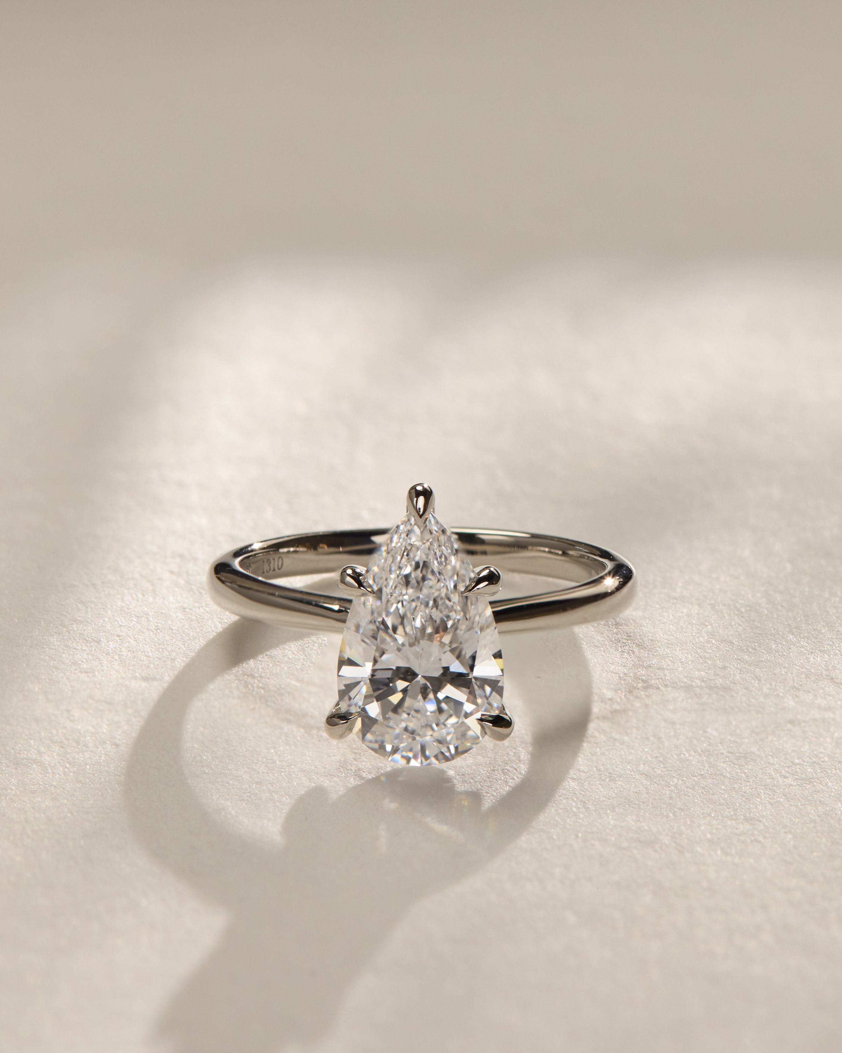 Aspen  5 Claw Pear Solitaire Lifestyle Image