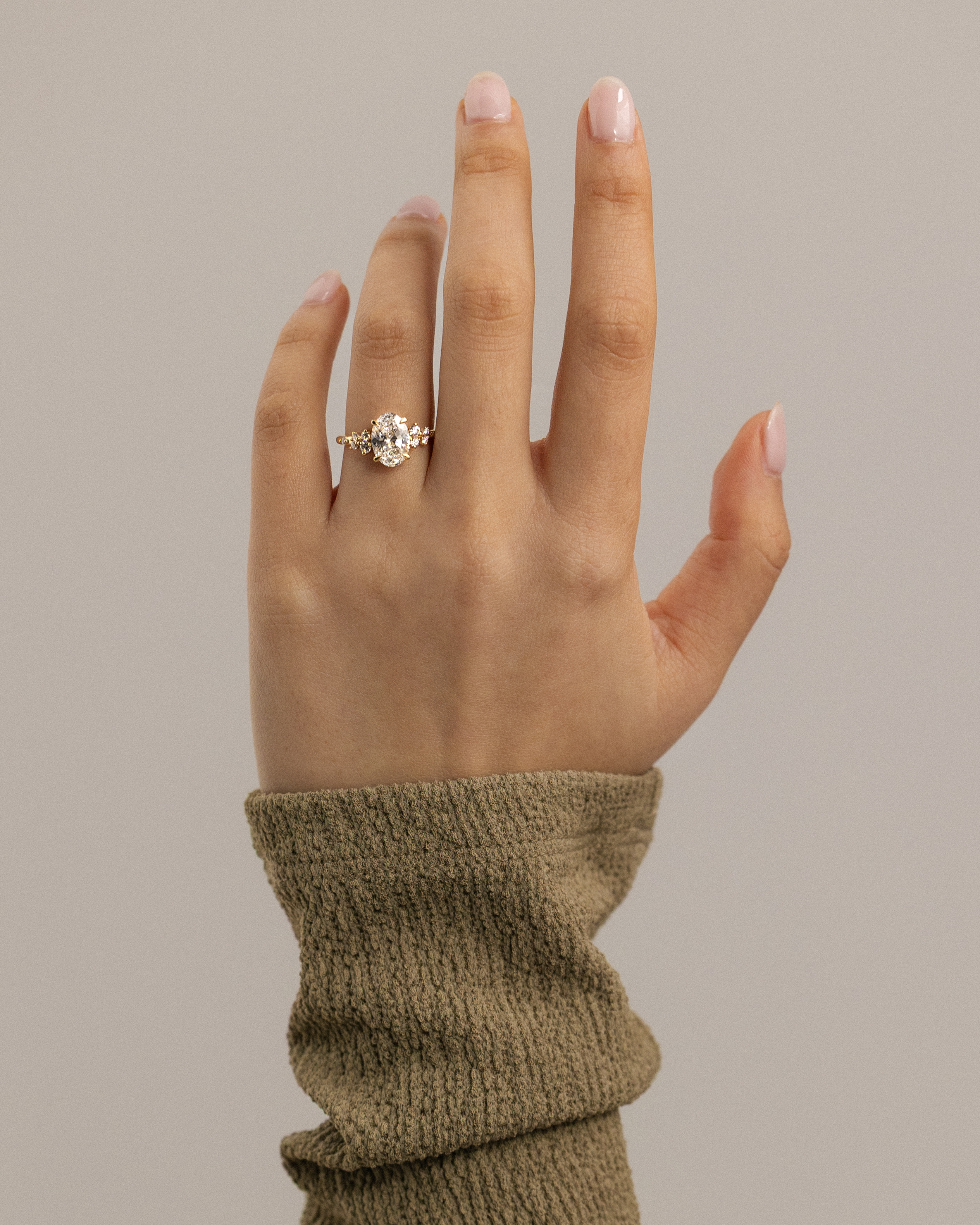 Bella  Oval Solitaire with Accent Stones Lifestyle Image