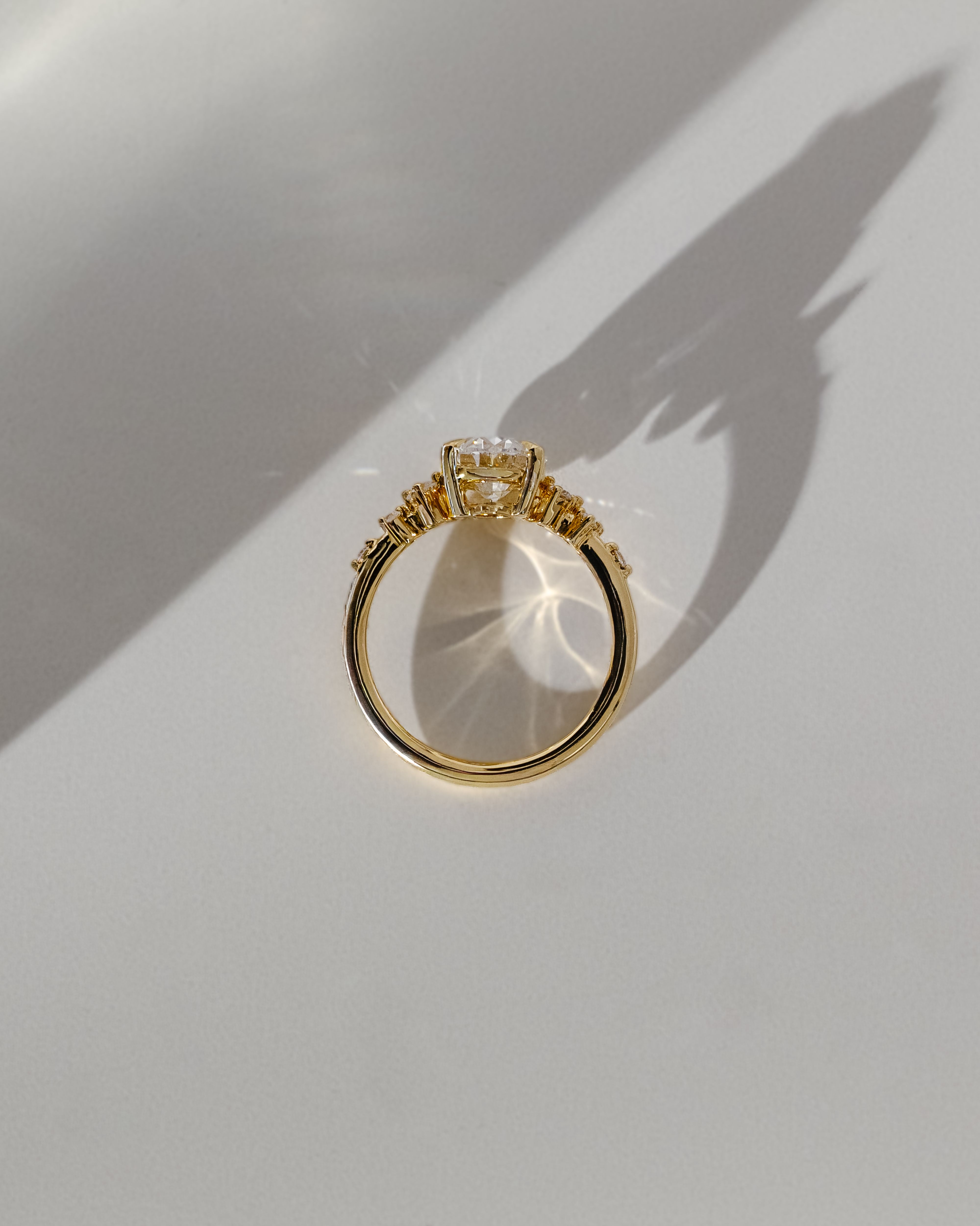 Bella  Oval Solitaire with Accent Stones Lifestyle Image