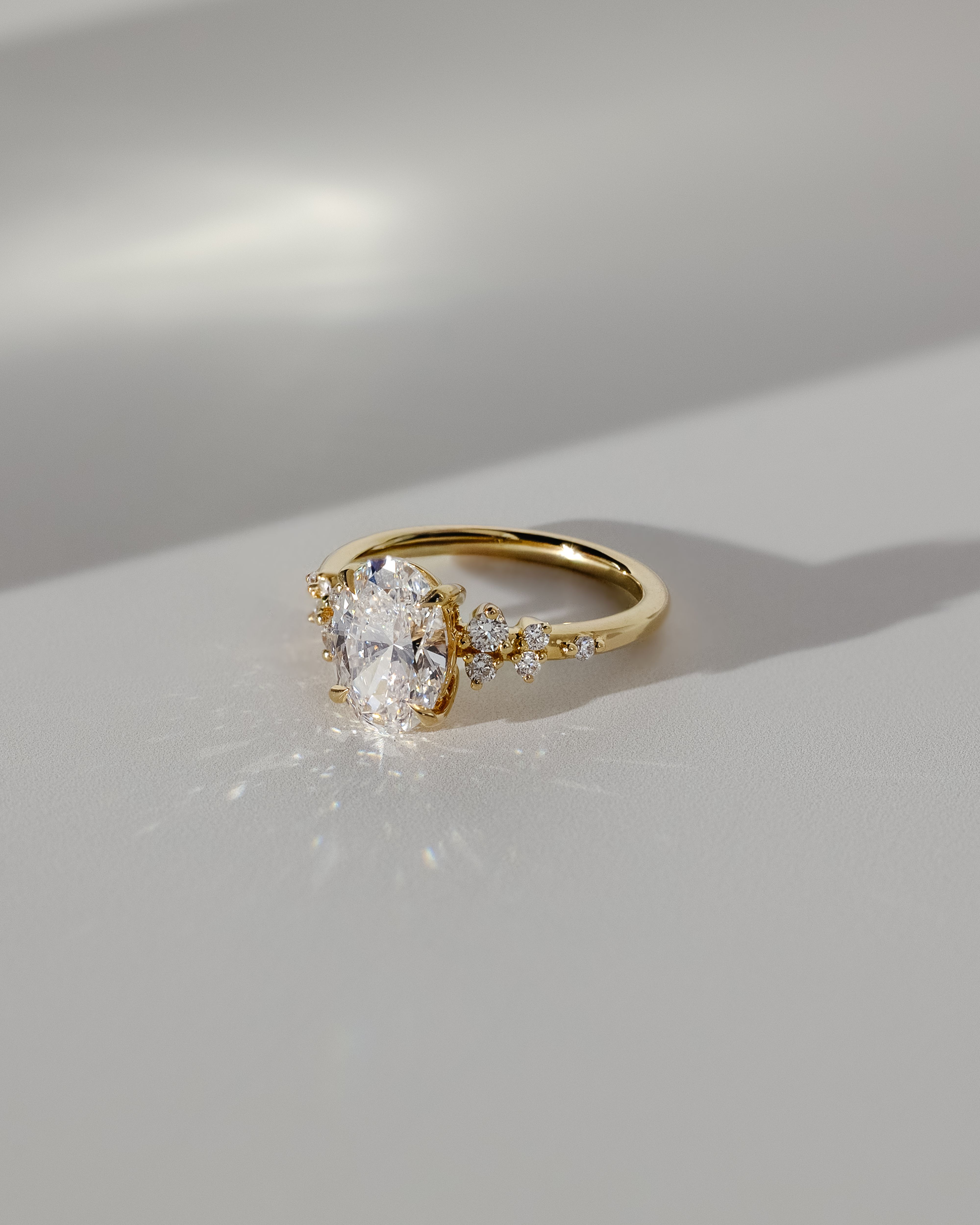 Bella  Oval Solitaire with Accent Stones Lifestyle Image