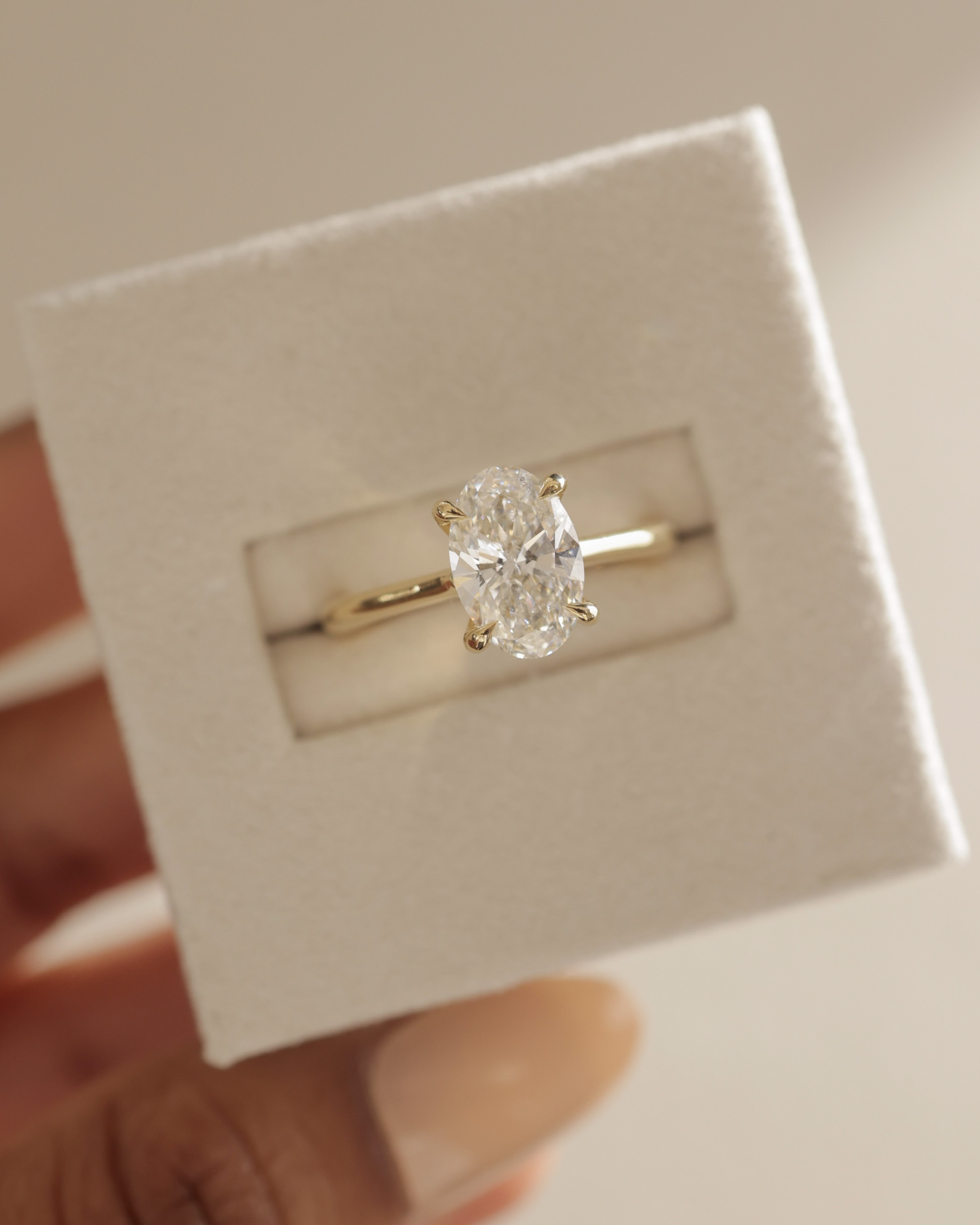 Bethany  Oval Solitaire with Hidden Halo Lifestyle Image