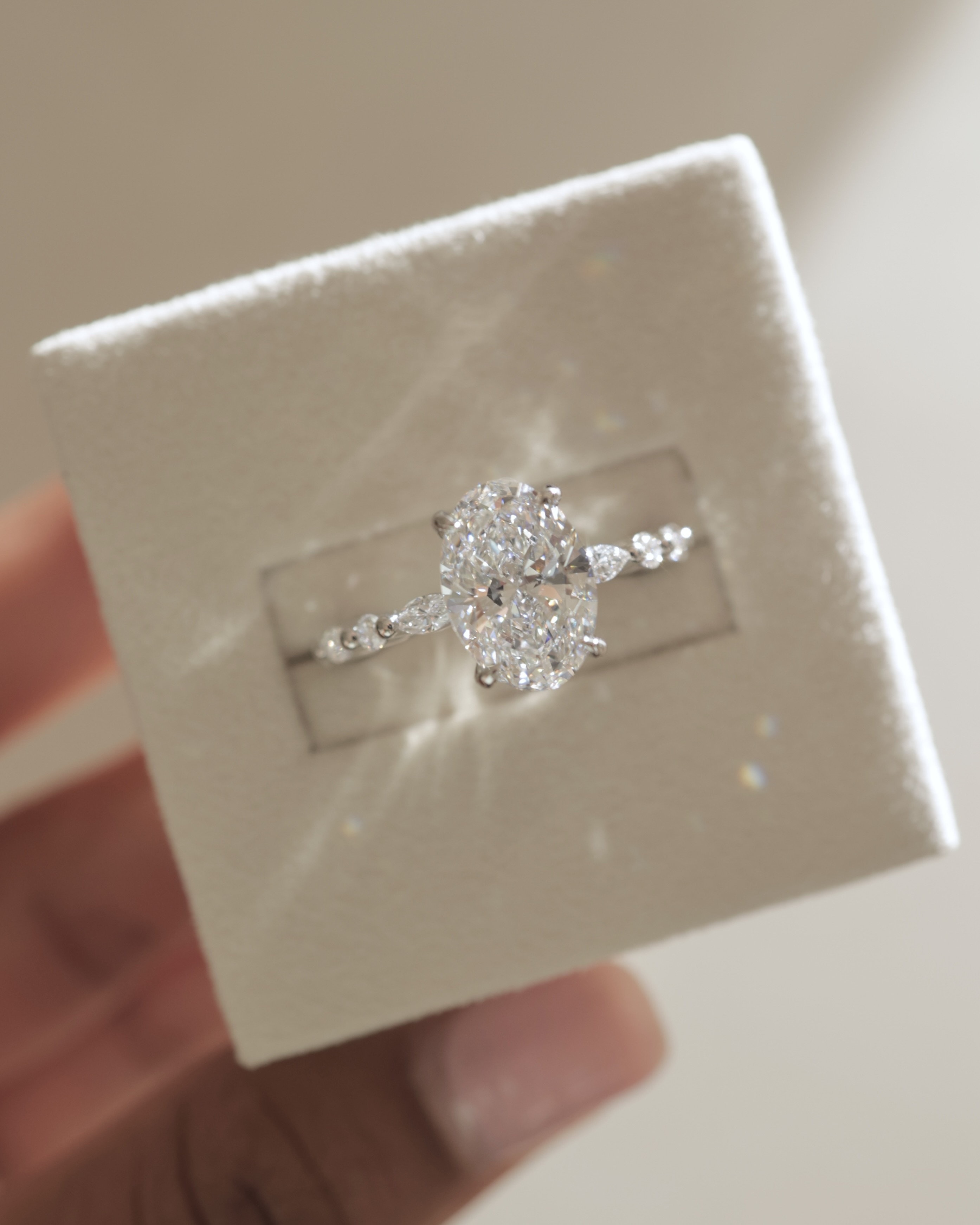 Brandi - Oval Solitaire with Accent Stones and Hidden Halo Lifestyle Image