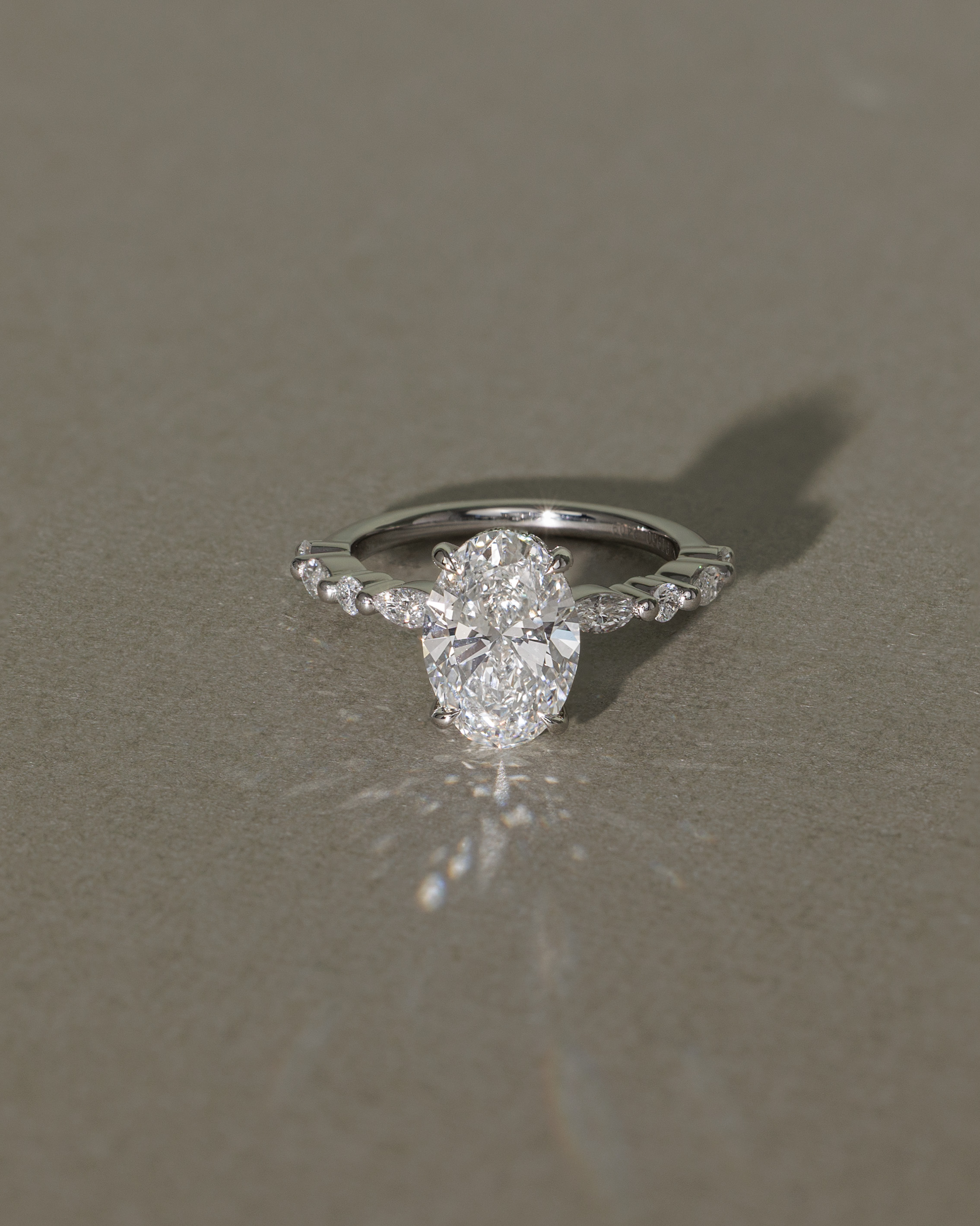 Brandi - Oval Solitaire with Accent Stones and Hidden Halo Lifestyle Image