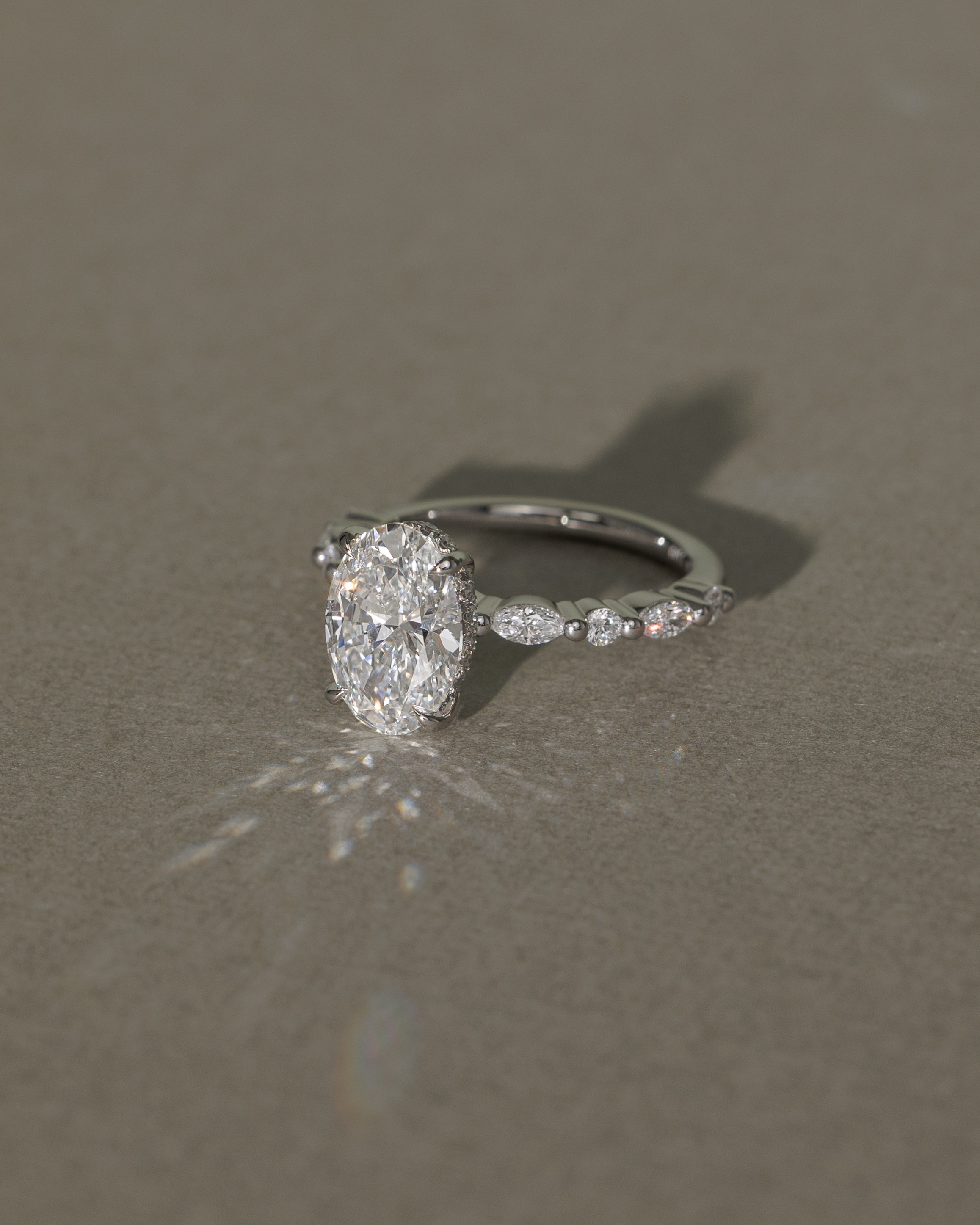 Brandi - Oval Solitaire with Accent Stones and Hidden Halo Lifestyle Image
