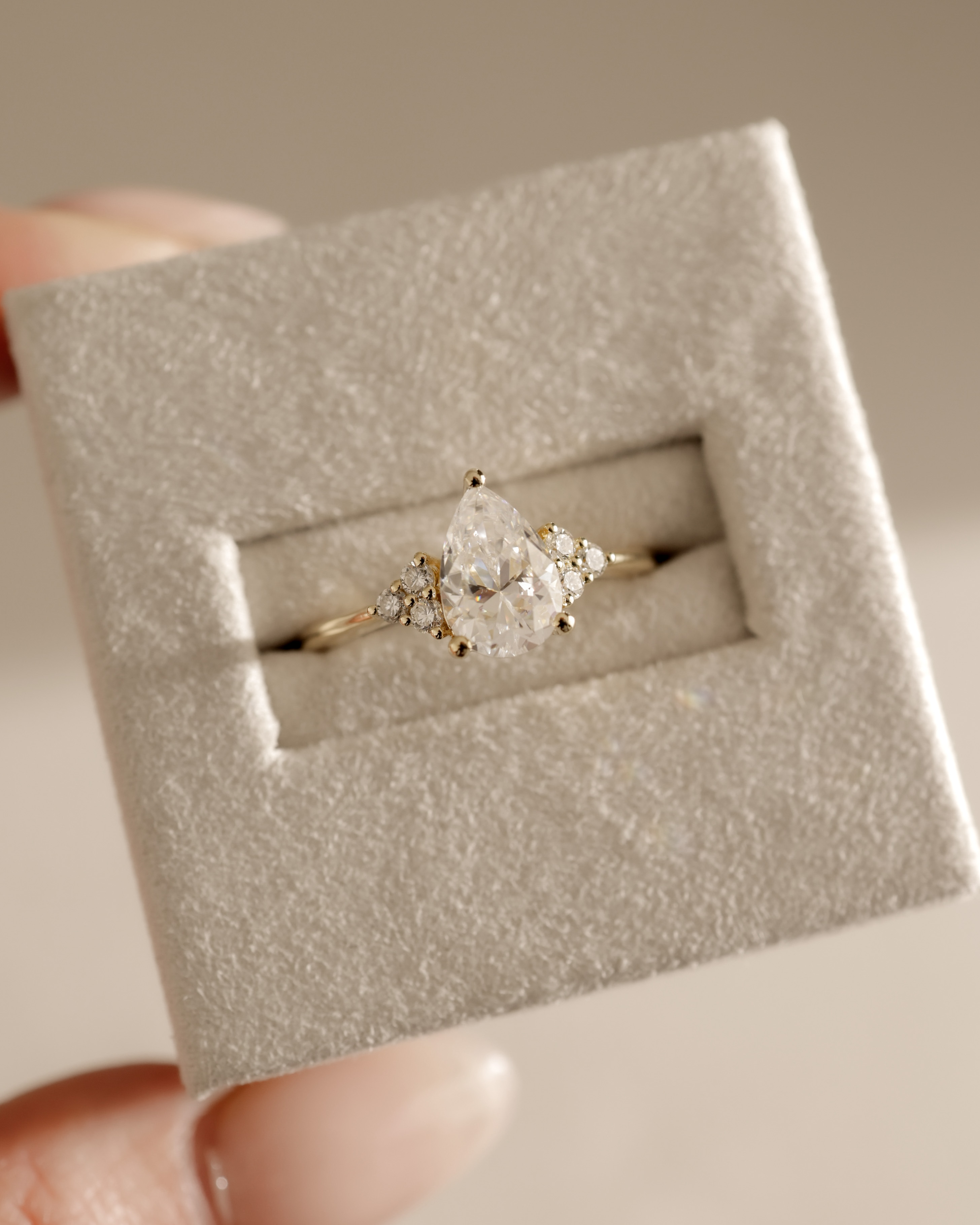 Brooke  3 Claw Pear Solitaire with Accent Stones Lifestyle Image