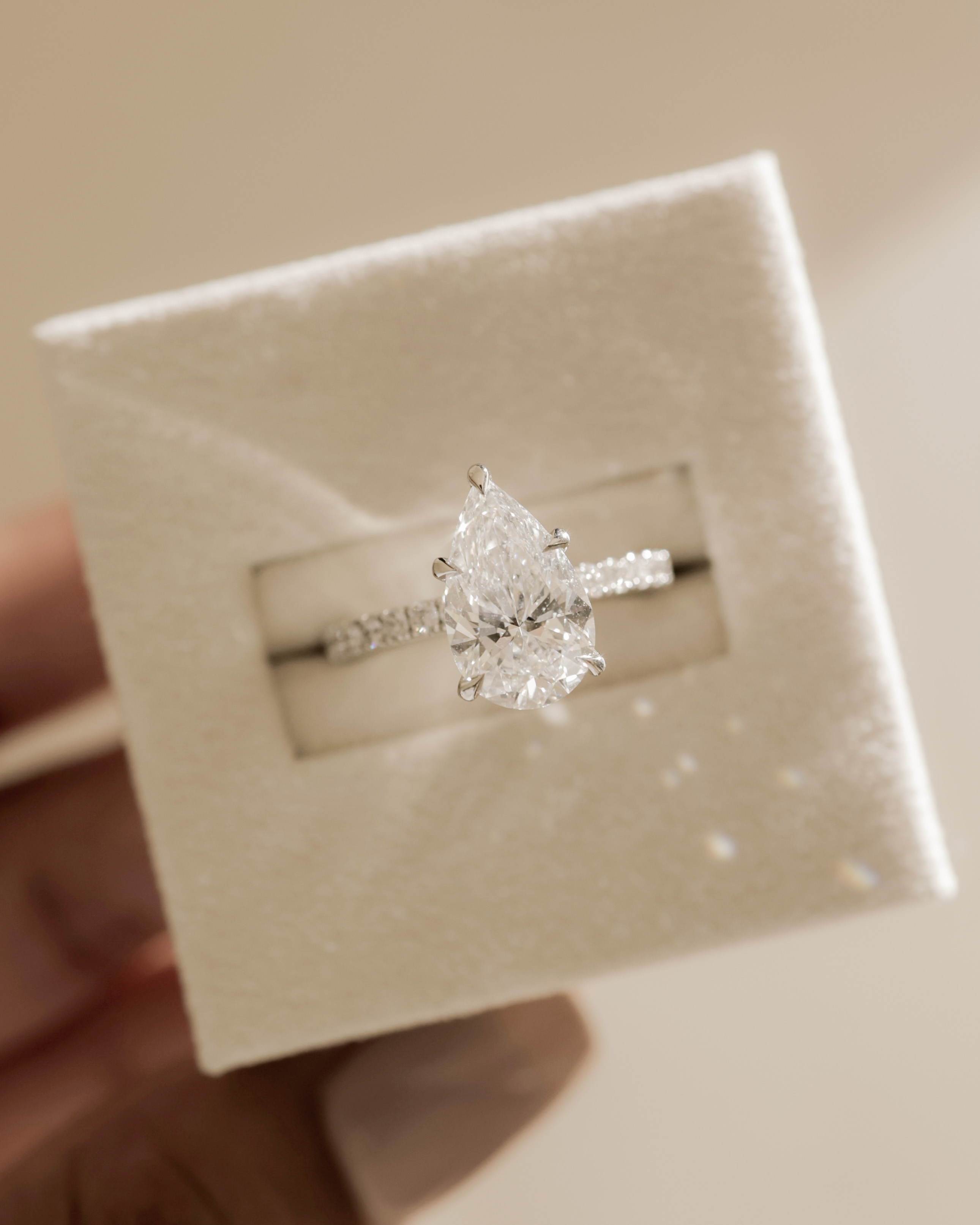 Brynlee - 5 Claw Pear Solitaire with 2/3 Pave Band Lifestyle Image