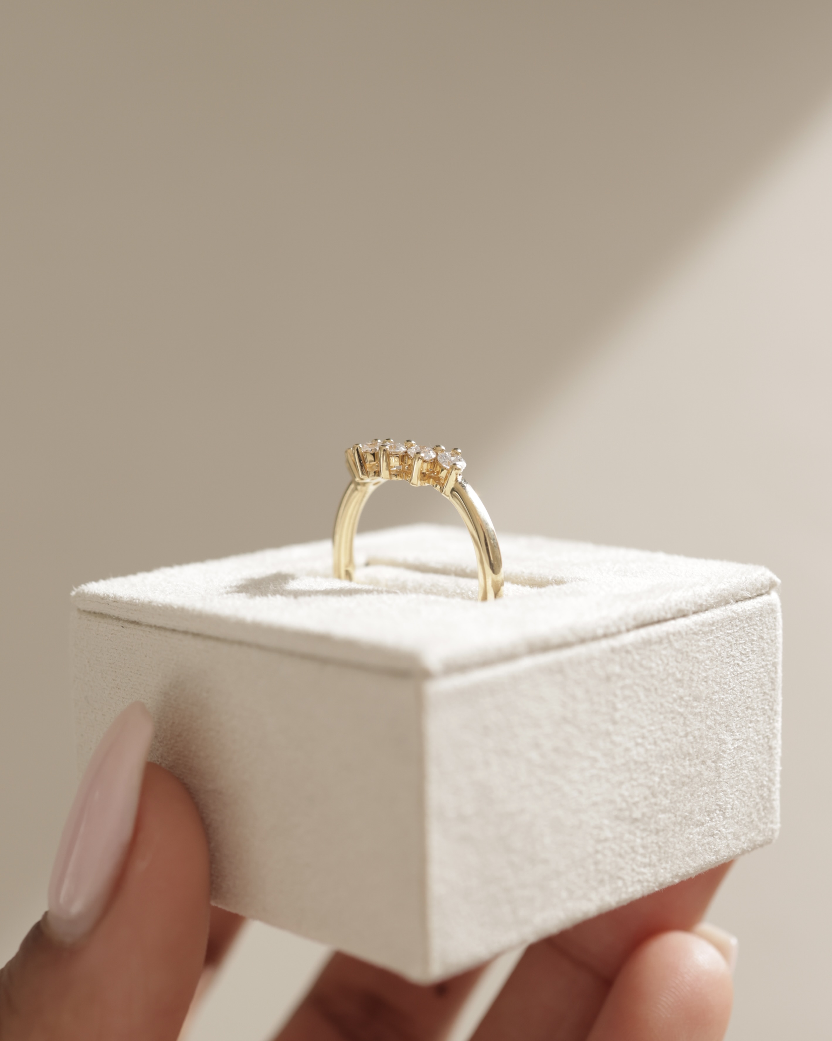 Celeste  Round Cut Curved Wedding Ring Lifestyle Image