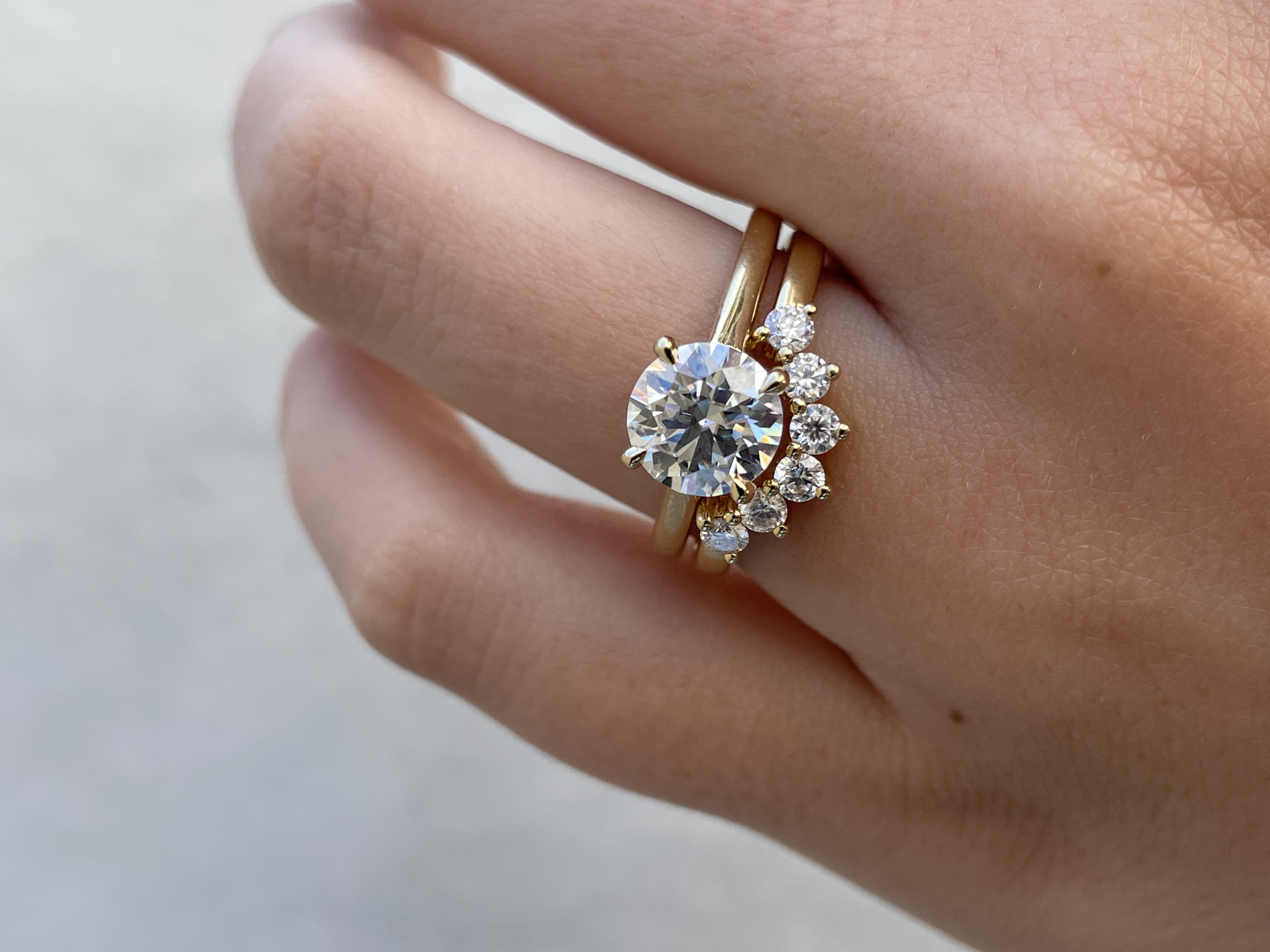 Celeste  Round Cut Curved Wedding Ring Lifestyle Image