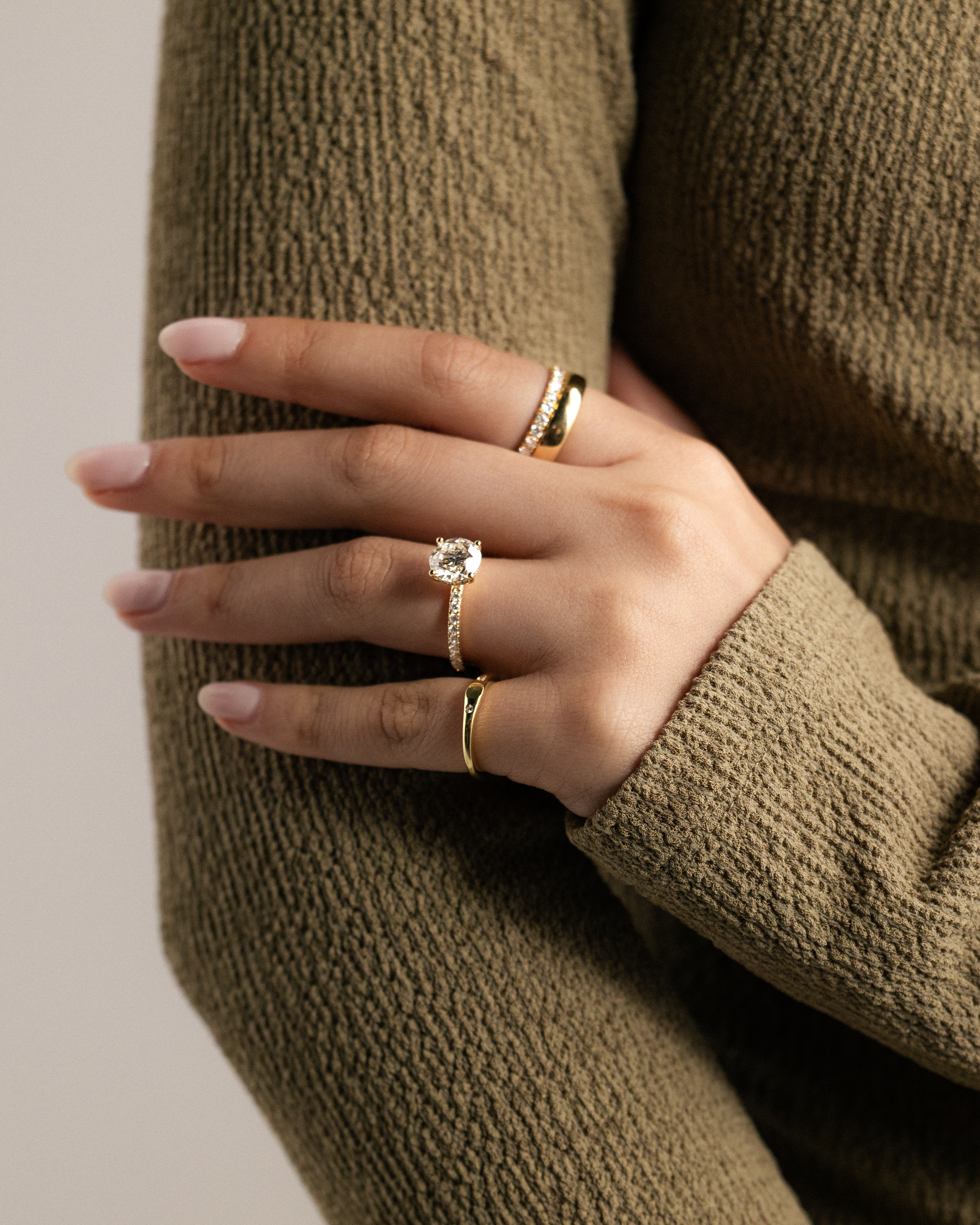 Charlie - 4 Claw Pav Round Solitaire with Hidden Halo Lifestyle Image