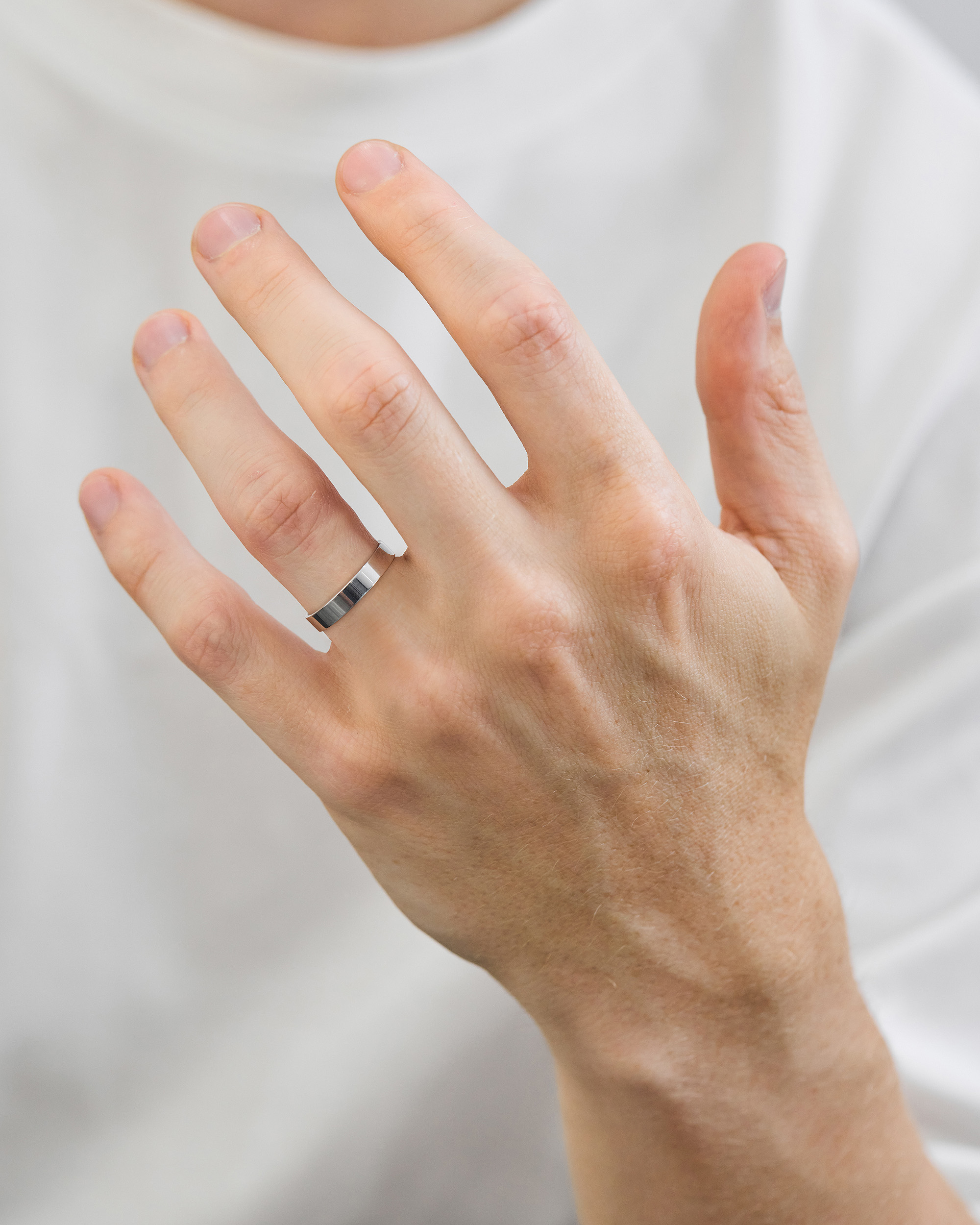 Classic Flat Mens Wedding Ring Lifestyle Image