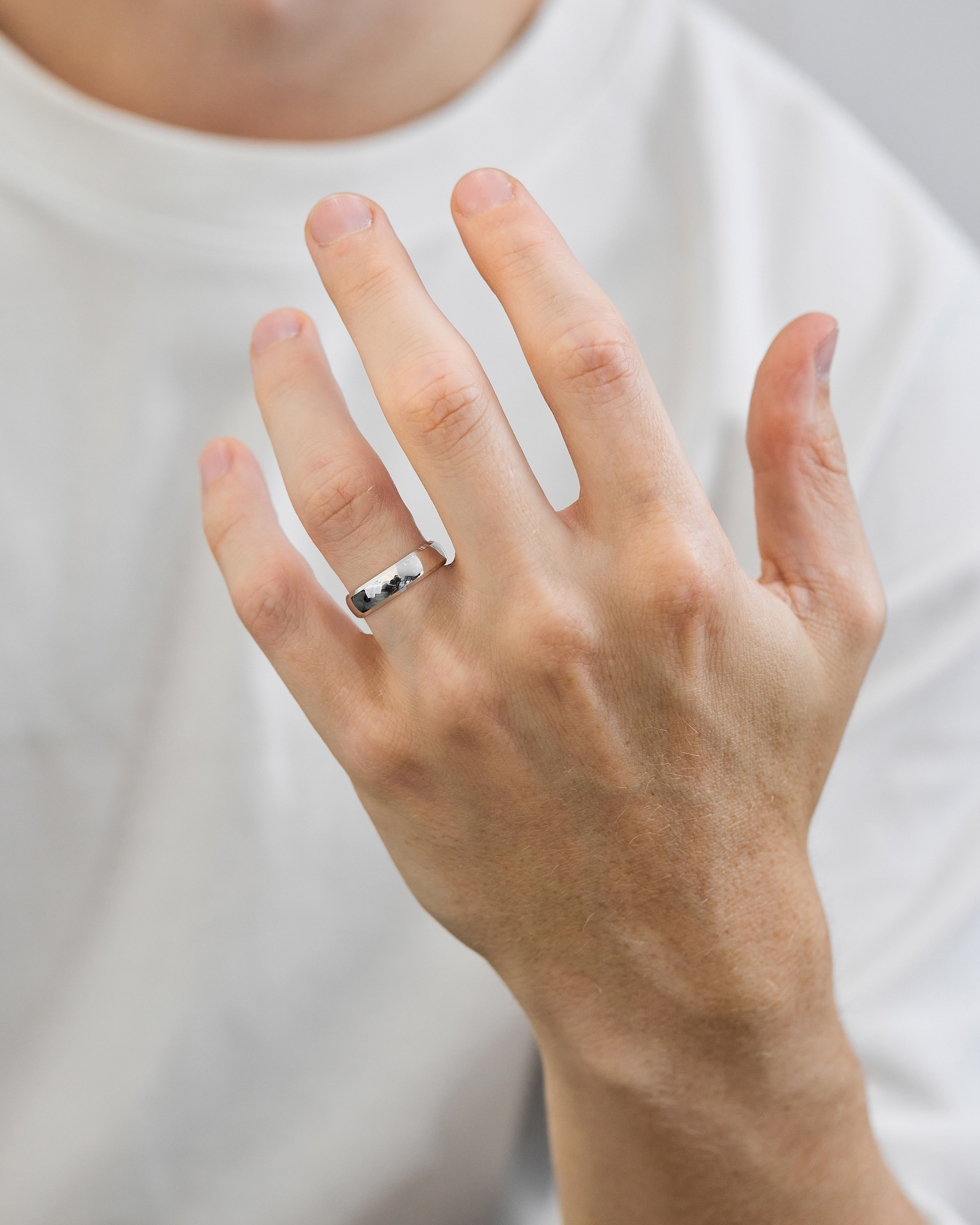 Classic Round Bevel Mens Wedding Ring Lifestyle Image