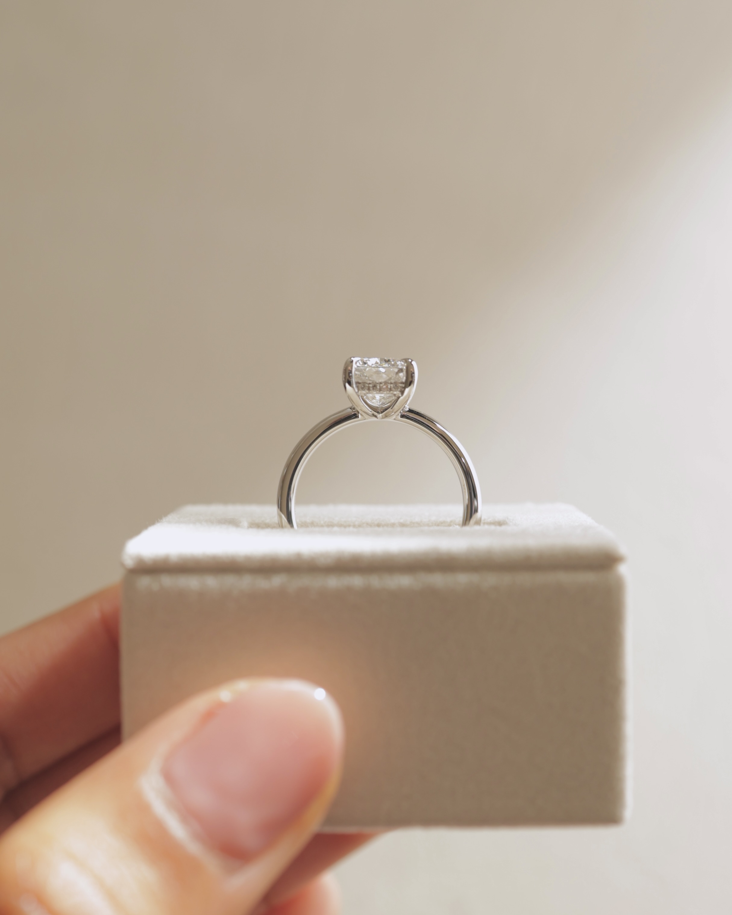 Cora - Elongated Cushion Solitaire with Cigar Band and Hidden Halo Lifestyle Image