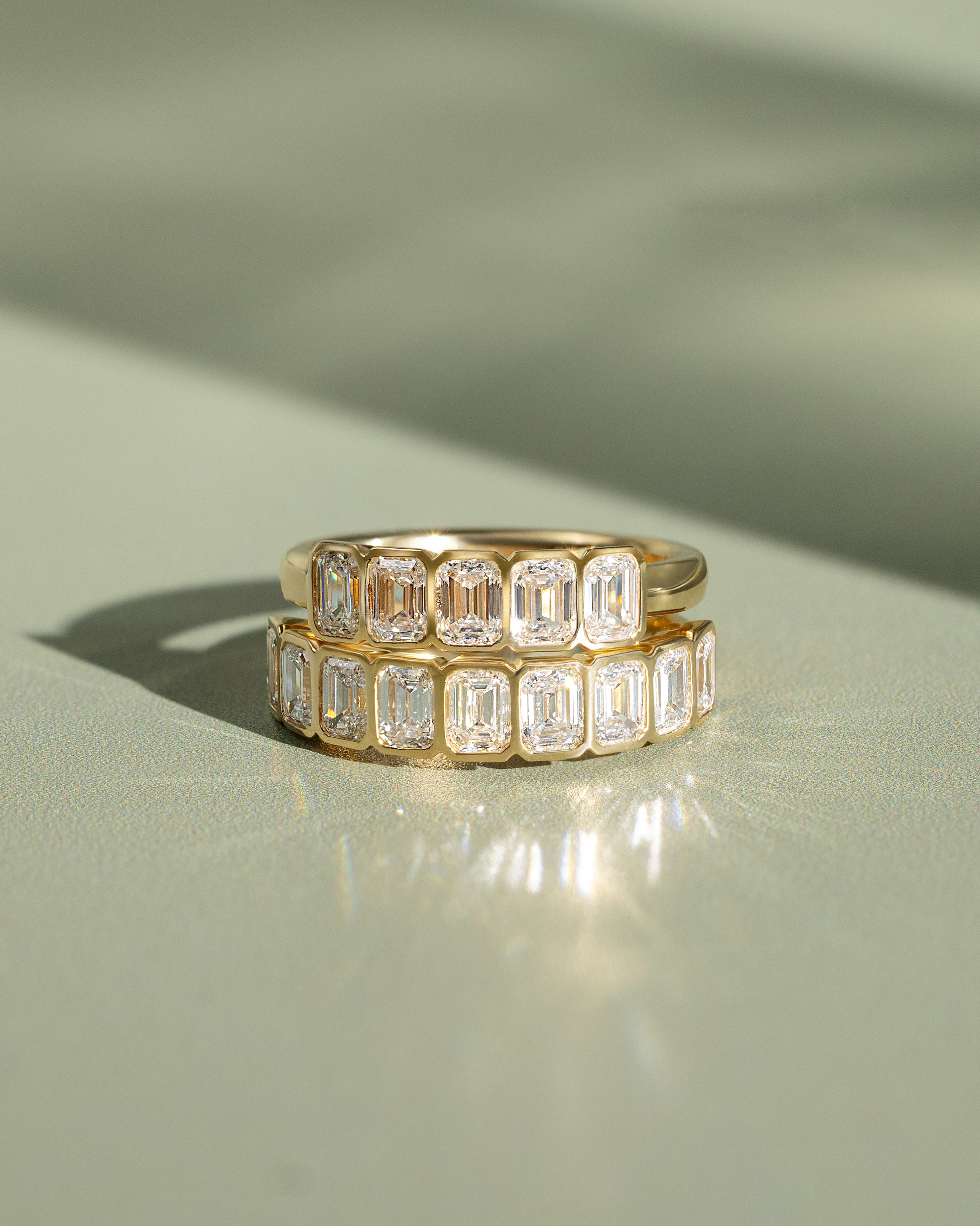 Dallas - Bezel Set Emerald Wedding Ring Lifestyle Image