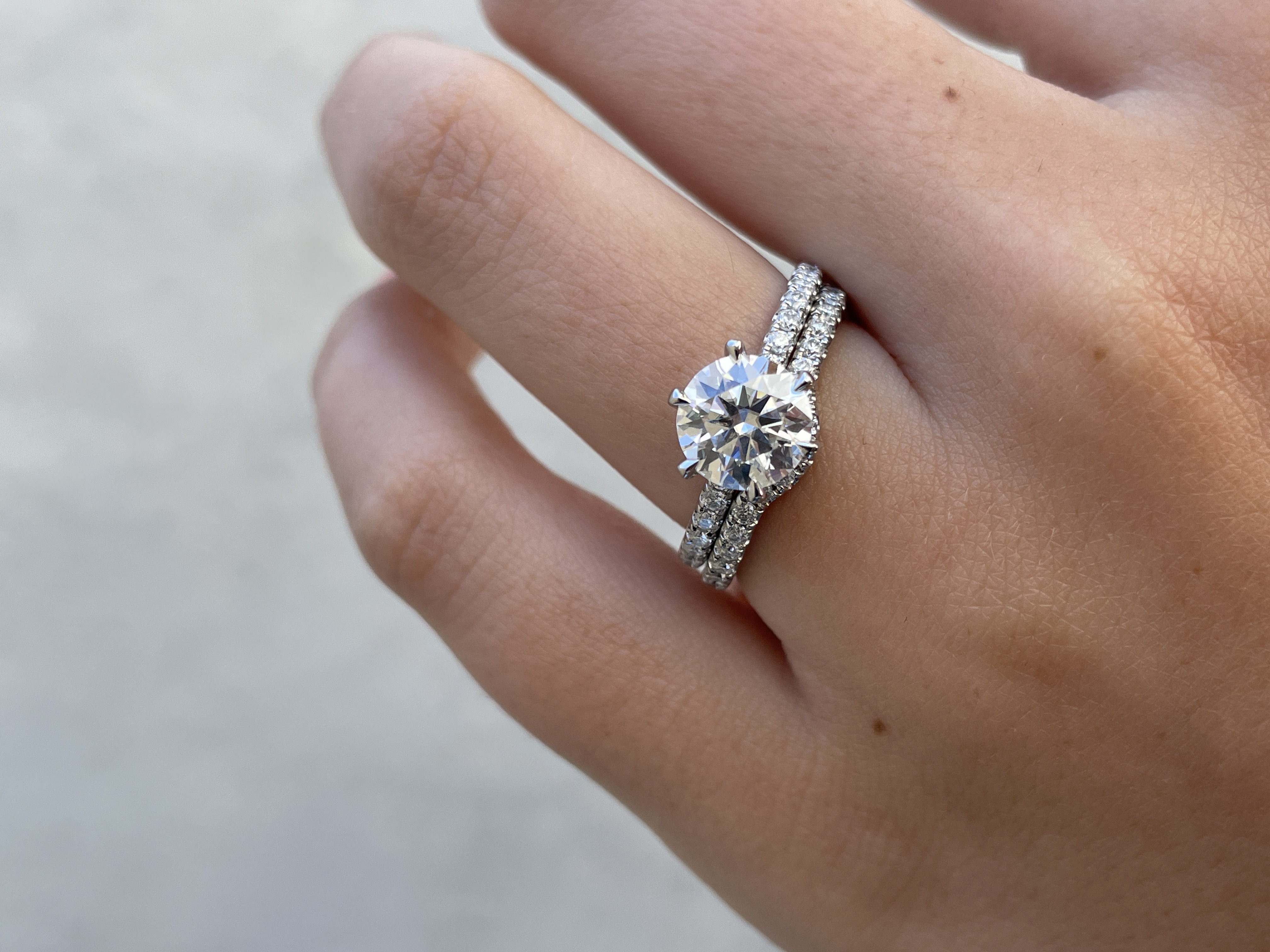 Demi  2/3 Pave Curved Wedding Ring Lifestyle Image