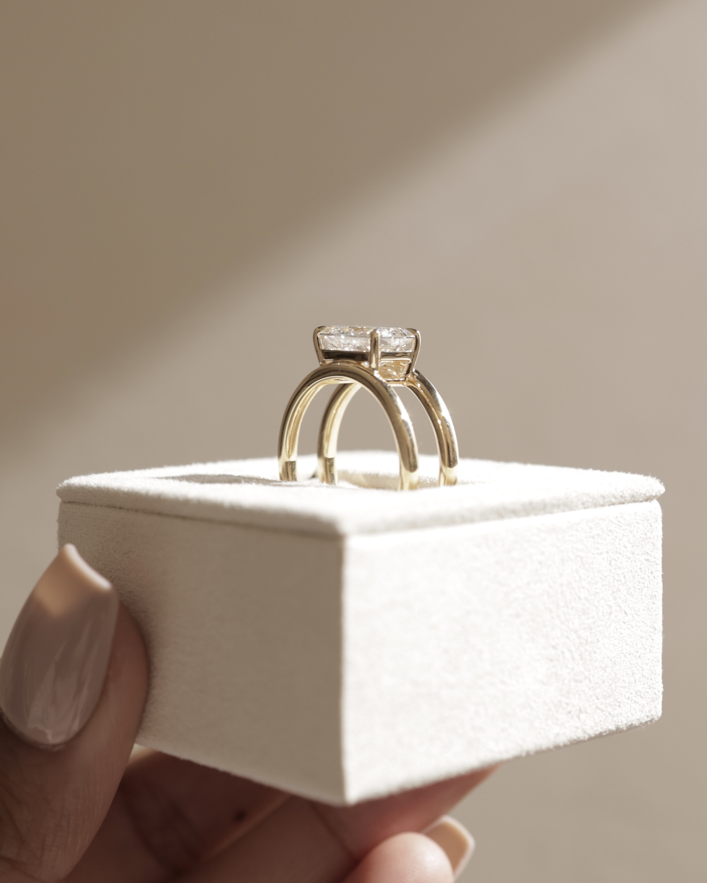 Devon - Emerald Solitaire with Double Band Lifestyle Image