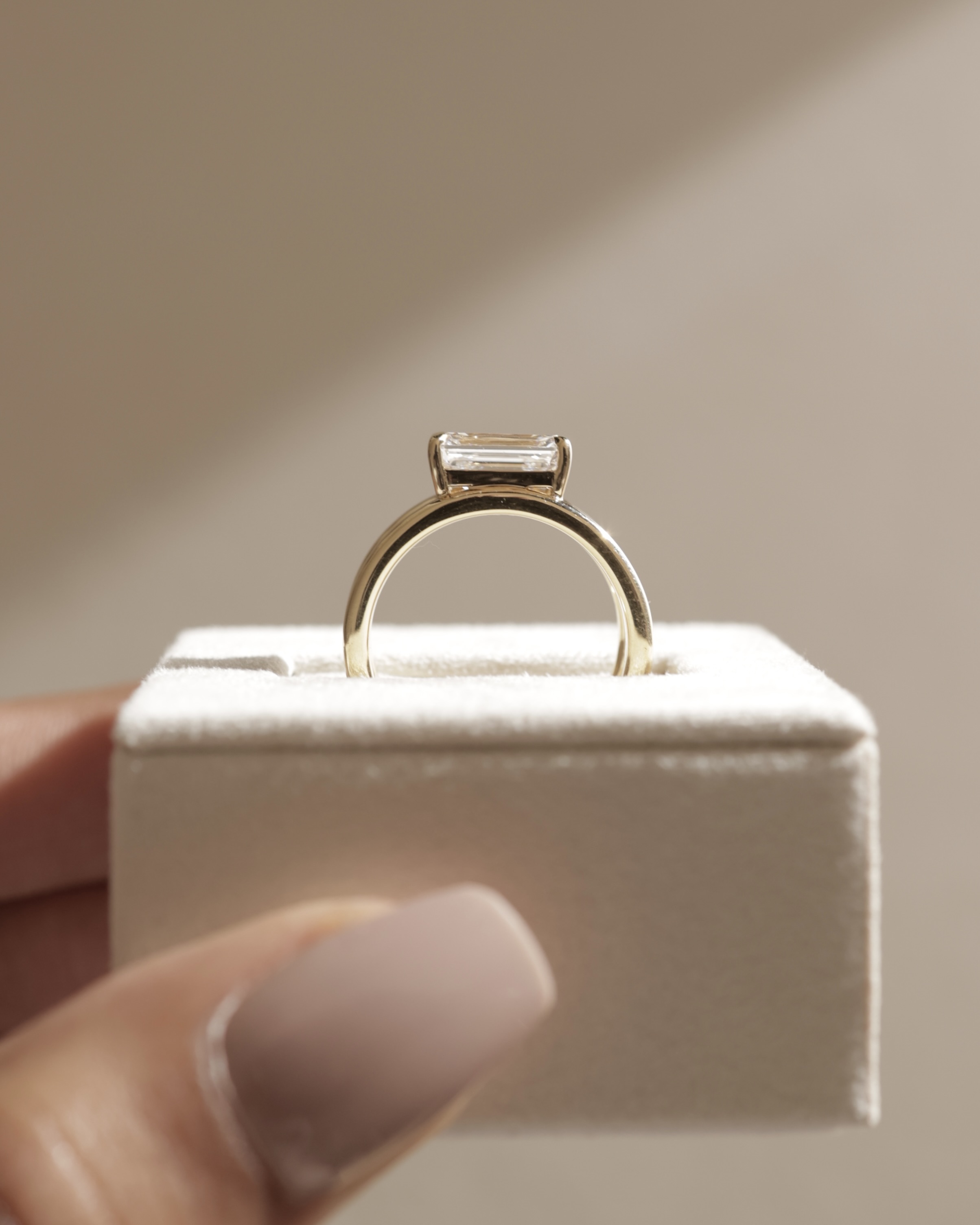 Devon - Emerald Solitaire with Double Band Lifestyle Image