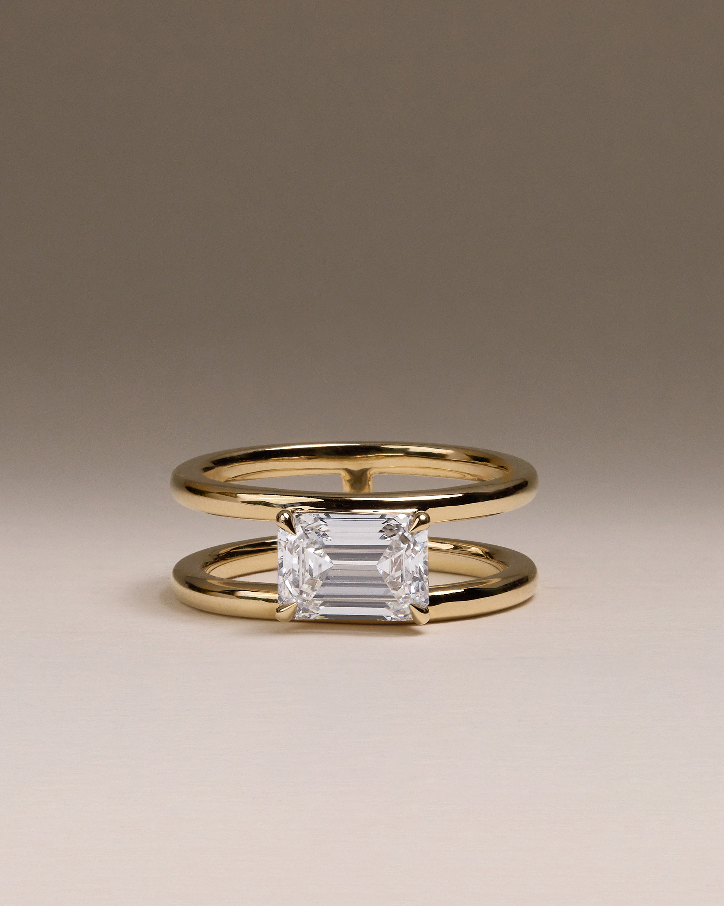 Devon - Emerald Solitaire with Double Band Lifestyle Image