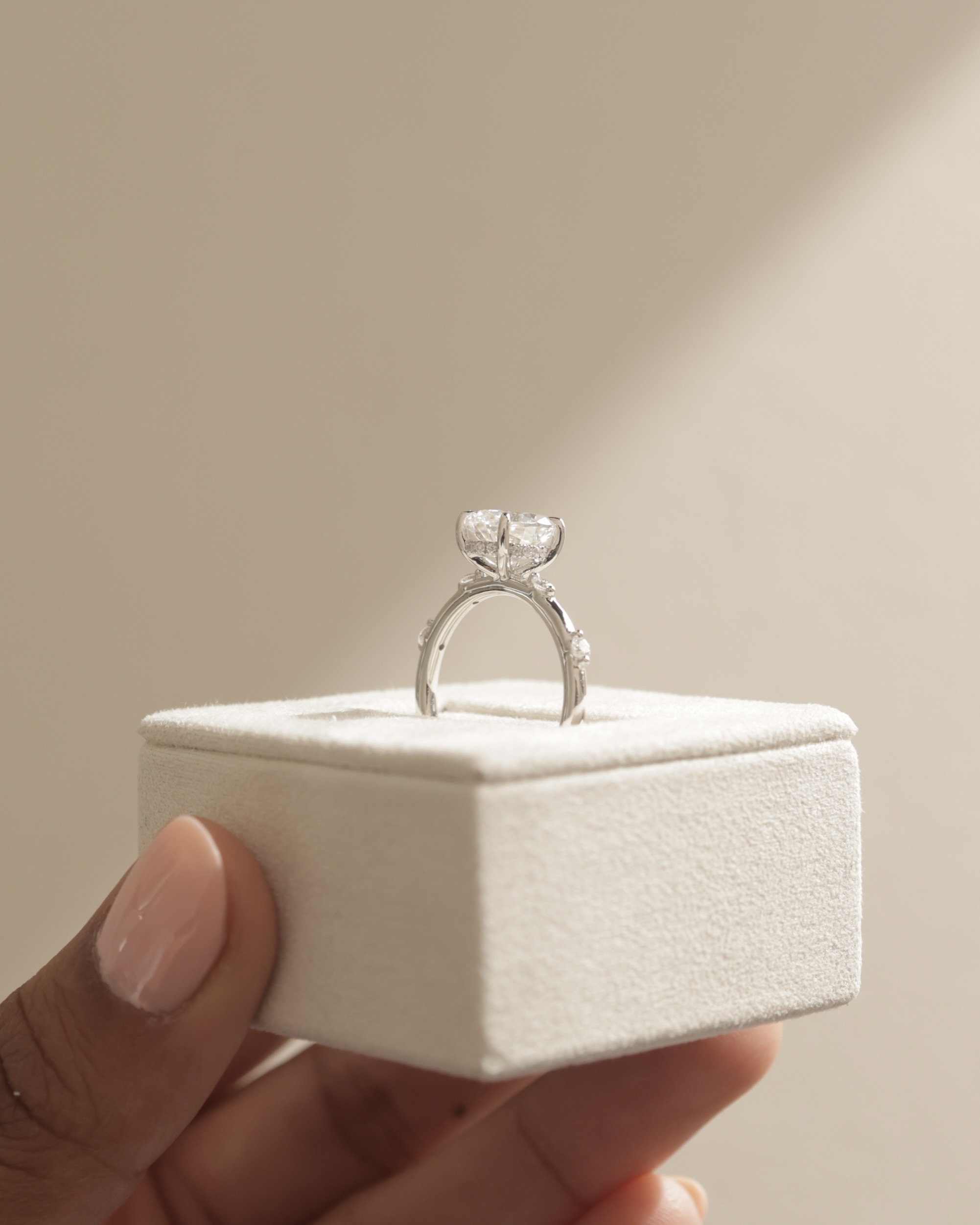 Elise  Oval Solitaire with Hidden Halo and Accent Stones Lifestyle Image